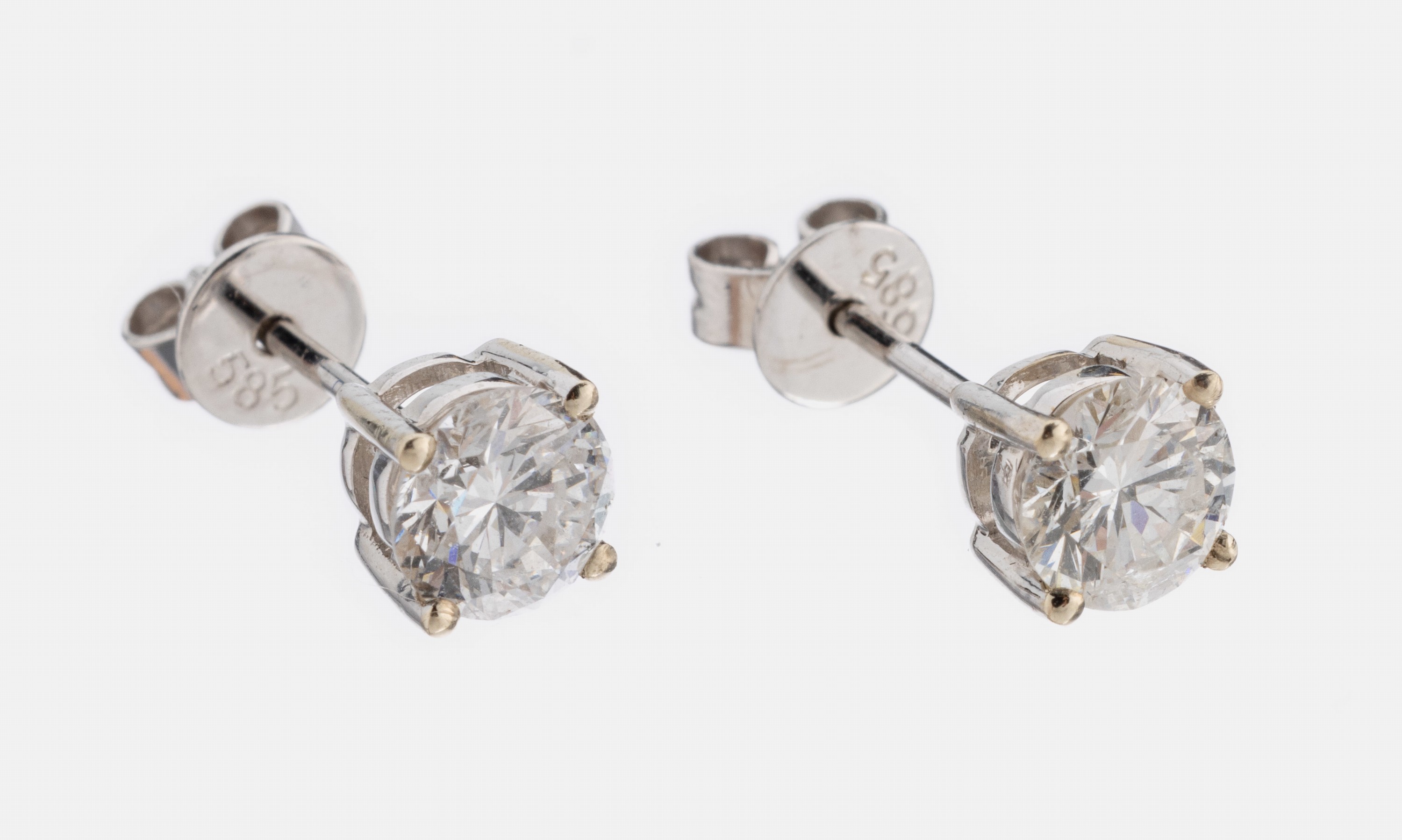Paar 14 kt Gold Brillant-Ohrstecker, GG 585/000, 2 Brillanten zus. ca. 1.05 ct Weiß/si-p1