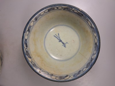 26781727k - 2 plates and two bowls, wooden sculpture, China, Ming Dynasty and 18th century, blue painting, plate with fish decoration and style. Landscape, diameter approx. 13.5 cm, crests with floral decoration, one with a hairline crack, one chip, diameter approx. 14 cm, all with traces of age, plus a wooden sculpture of an official, carved, remains of an old version, 19th century, height approx. 22cm
