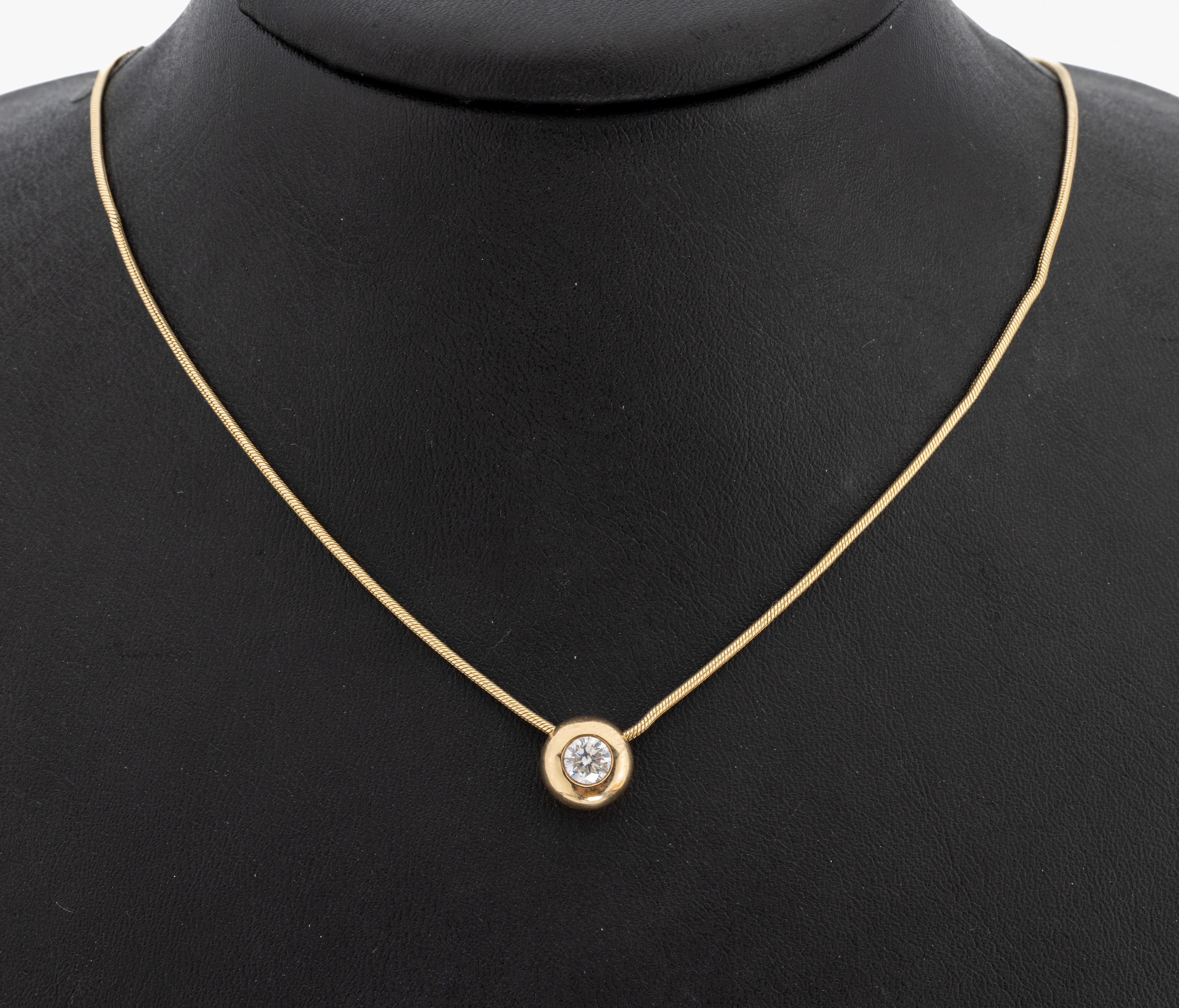 14 kt Gold Brillant-Collier, GG 585/000, Brillant ca. 0.52 ct Weiß/si, an Schlangenkette L. ca. 44 cm, Knickstelle, Karabinerschließe, ca. 6.5 g