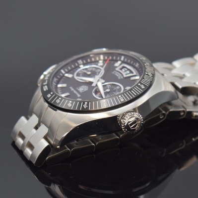 26782664d - TAG HEUER Mercedes Benz SLR to 3500 pieces limited chronograph in steel reference CAG2111, Switzerland around 2008, self winding, original bracelet with deployant clasp, case back 6-times screwed, revolving inner bezel by crown outside at 9, bezel with tachometer graduation, black textured dial with silvered hour-indices, silvered luminous hands, 30 minutes-counter, date, calibre 17, diameter approx. 44 mm, length approx. 19 cm, condition 2