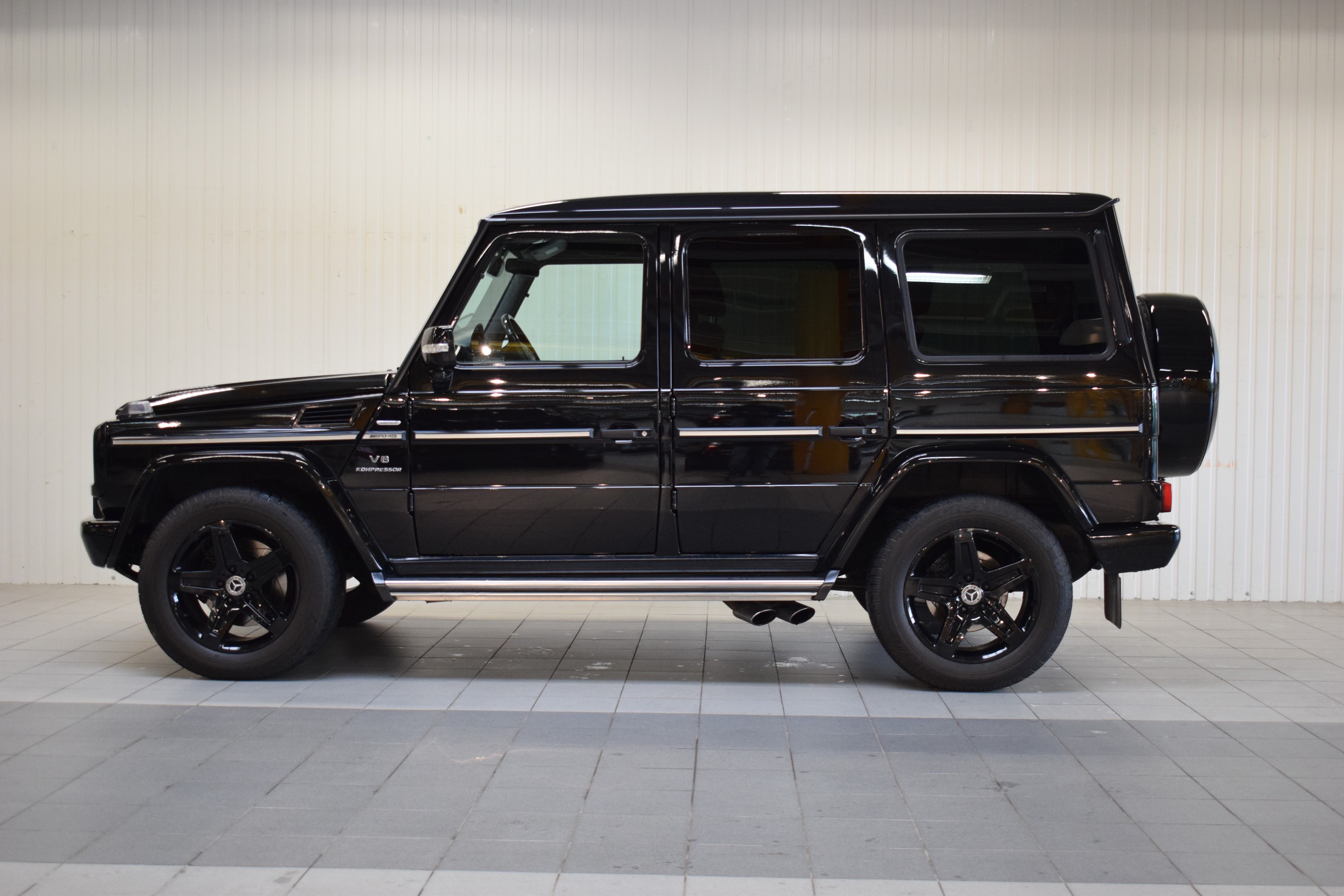 Detail f: Mercedes-Benz G55 AMG 4-Matic, EZ 2008, Laufleistung 129.019 km, 372 kW/507 PS, V8 Kompressor , Automatikgetriebe, Farbe: schwarz, Leder, ...