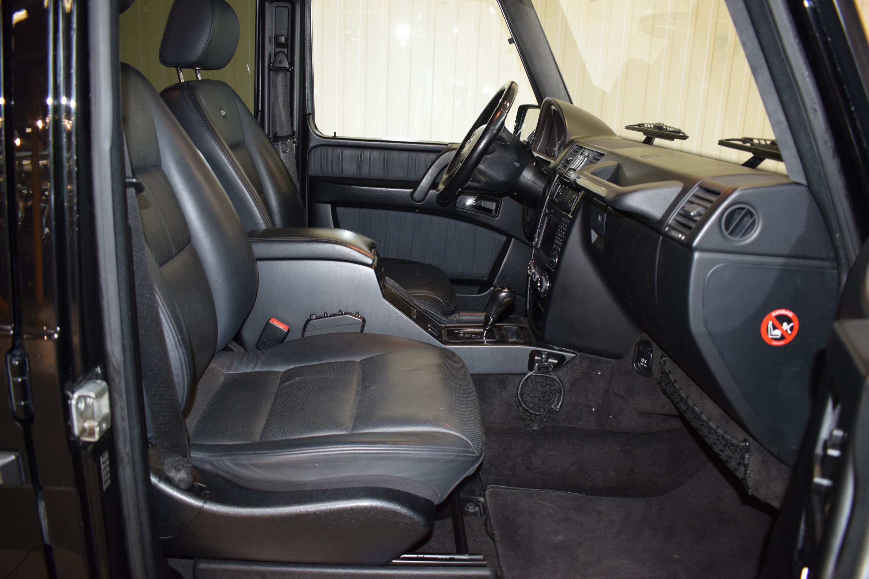 Detail i: Mercedes-Benz G55 AMG 4-Matic, EZ 2008, Laufleistung 129.019 km, 372 kW/507 PS, V8 Kompressor , Automatikgetriebe, Farbe: schwarz, Leder, ...