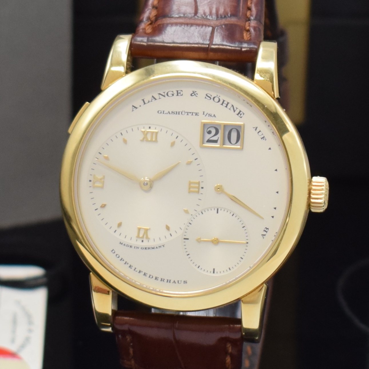 Detail a: A. LANGE & SÖHNE sehr seltene frühe Lange 1 Referenz 101.001 in GG 750/000, Handaufzug, noch massiver Goldboden 6-fach verschr., innen bez. R.101, ...