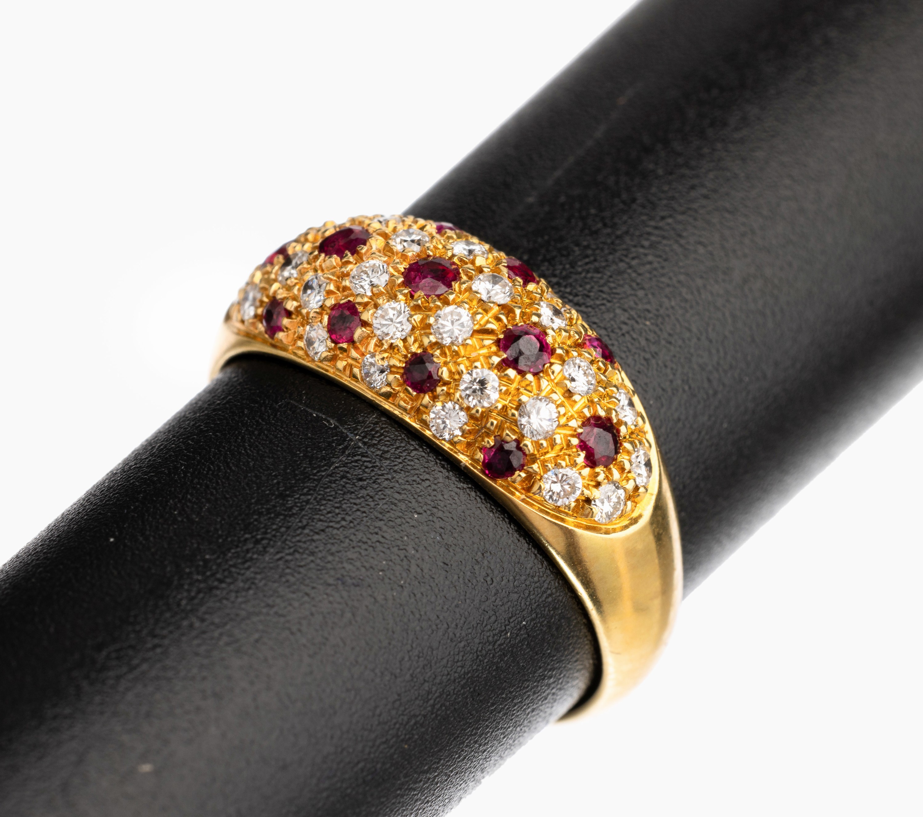 18 kt Gold Rubin Brillant Ring, GG 750/000,13 rundfacett. Rubine zus. ca. 0.37 ct, 28 Brillanten zus. ca. 0.36 ct Weiß/si, total ca.4.8 g, RW 55