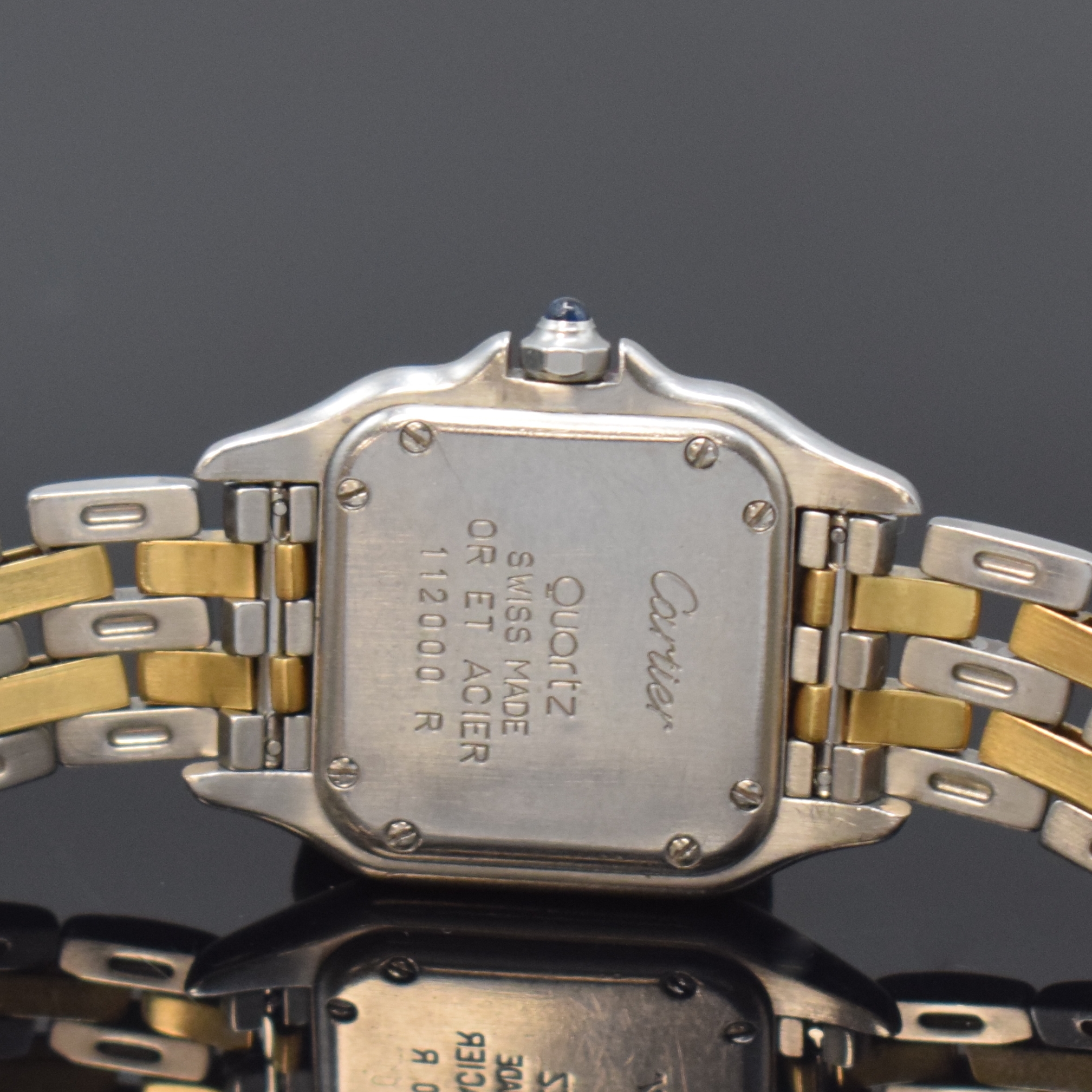 Detail d: CARTIER Panthere Damenarmbanduhr in Stahl/ Gold Referenz 1120, Schweiz um 1990, quarz, Boden 8-fach verschr., Schmuckkrone, orig. Gliederband m. ...