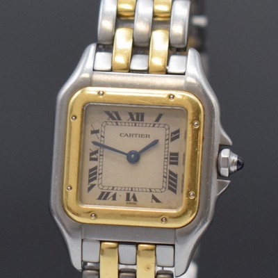 26783350a - CARTIER Panthere ladies wristwatch in steel/ gold reference 1120, Switzerland around 1990, quartz, back with 8 screws, jeweled crown, original bracelet with butterfly buckle, silvered dial patinated/spotty, Roman numerals, blued steel hands, measures approx. 30 x 23 mm, length approx. 17 cm, condition 2-3