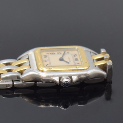 26783350c - CARTIER Panthere ladies wristwatch in steel/ gold reference 1120, Switzerland around 1990, quartz, back with 8 screws, jeweled crown, original bracelet with butterfly buckle, silvered dial patinated/spotty, Roman numerals, blued steel hands, measures approx. 30 x 23 mm, length approx. 17 cm, condition 2-3