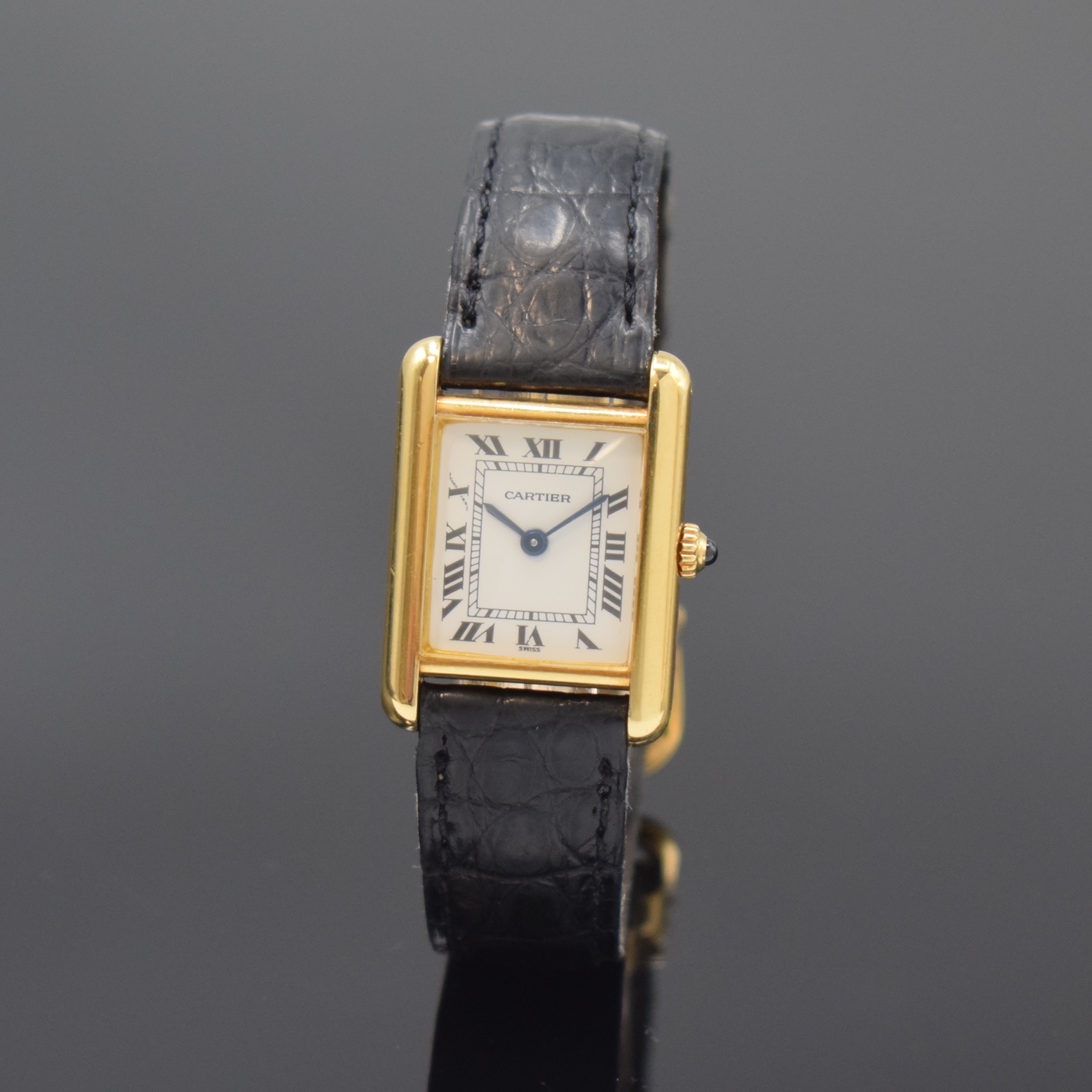 CARTIER Paris Tank Armbanduhr in GG 750/000, Schweiz um 1990, quarz, Gehäuse seitl. 4-fach verschr., orig. Lederband m. verg. Faltschl., ...