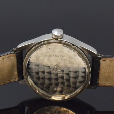 26783434e - OMEGA gents wristwatch reference 295 in steel, Switzerland around 1940, manual winding, screwed down case back, silvered dial patinated/spotty, Arabic numerals, blued original hands corroded, constant second at 6, calibre 26,5 T2 SOB, 15 jewels, movement, case and dial signed, diameter approx. 31 mm, additional information of Omega as copy enclosed, condition 2