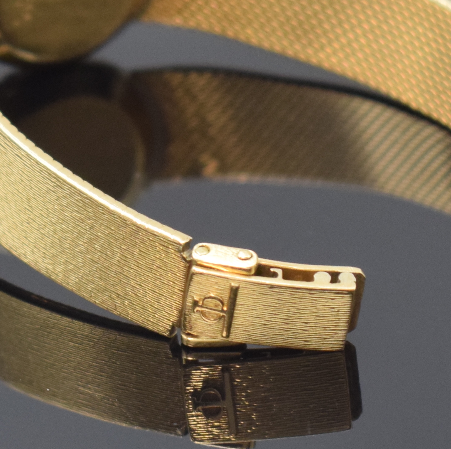 Detail b: BAUME & MERCIER Damenarmbanduhr in GG 750/000 mit Diamanten, Schweiz um 1975, Handaufzug, Milanaiseband, Boden aufgedr., Lünette aufw. m. Diamanten ...