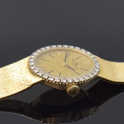 26783861d - BAUME & MERCIER Damenarmbanduhr in GG 750/000 mit Diamanten, Schweiz um 1975, ...