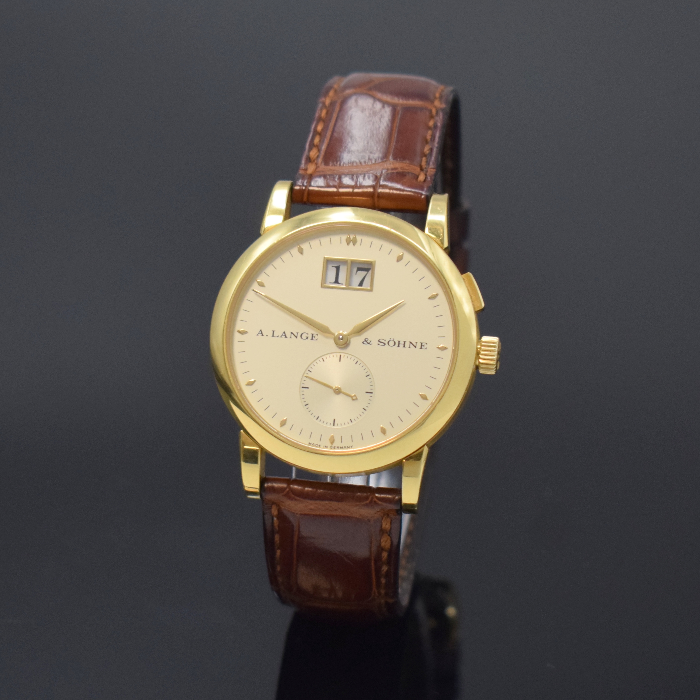 A. LANGE & SÖHNE Armbanduhr Saxonia in GG 750/000 Referenz 105.021, Handaufzug, Deutschland um 2000, beids. vergl. Geh. inkl. orig. Lederband m. ...