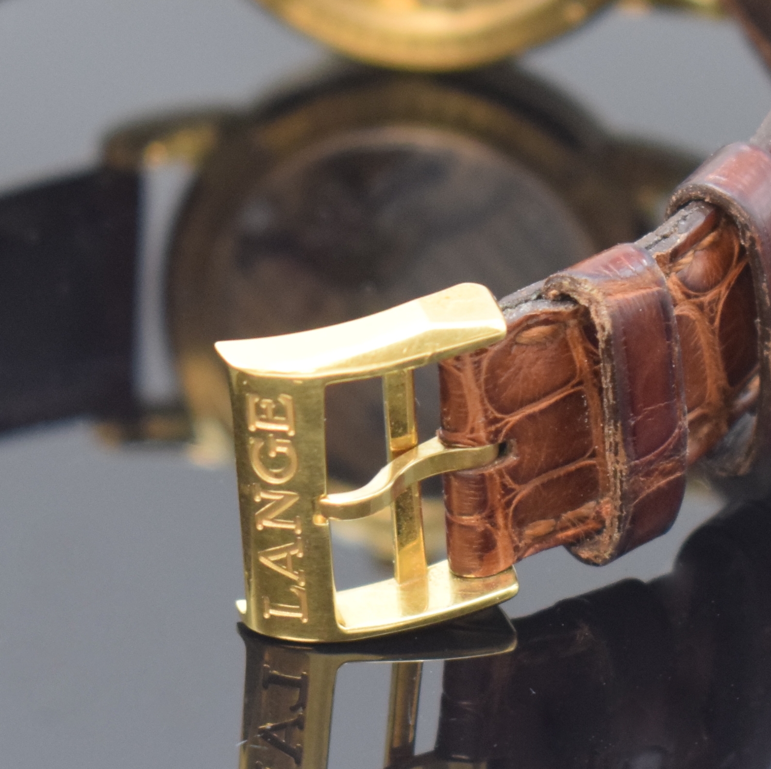 Detail b: A. LANGE & SÖHNE Armbanduhr Saxonia in GG 750/000 Referenz 105.021, Handaufzug, Deutschland um 2000, beids. vergl. Geh. inkl. orig. Lederband m. ...
