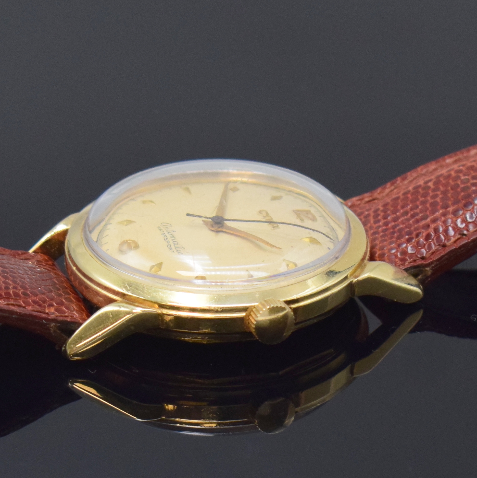 Detail b: CYMA Herrenarmbanduhr in GG 585/000, Schweiz / USA um 1950, Hammerautomatik, verschr. USA-Geh., Boden sign., silb. orig. Zifferbl. pat., gold. ...