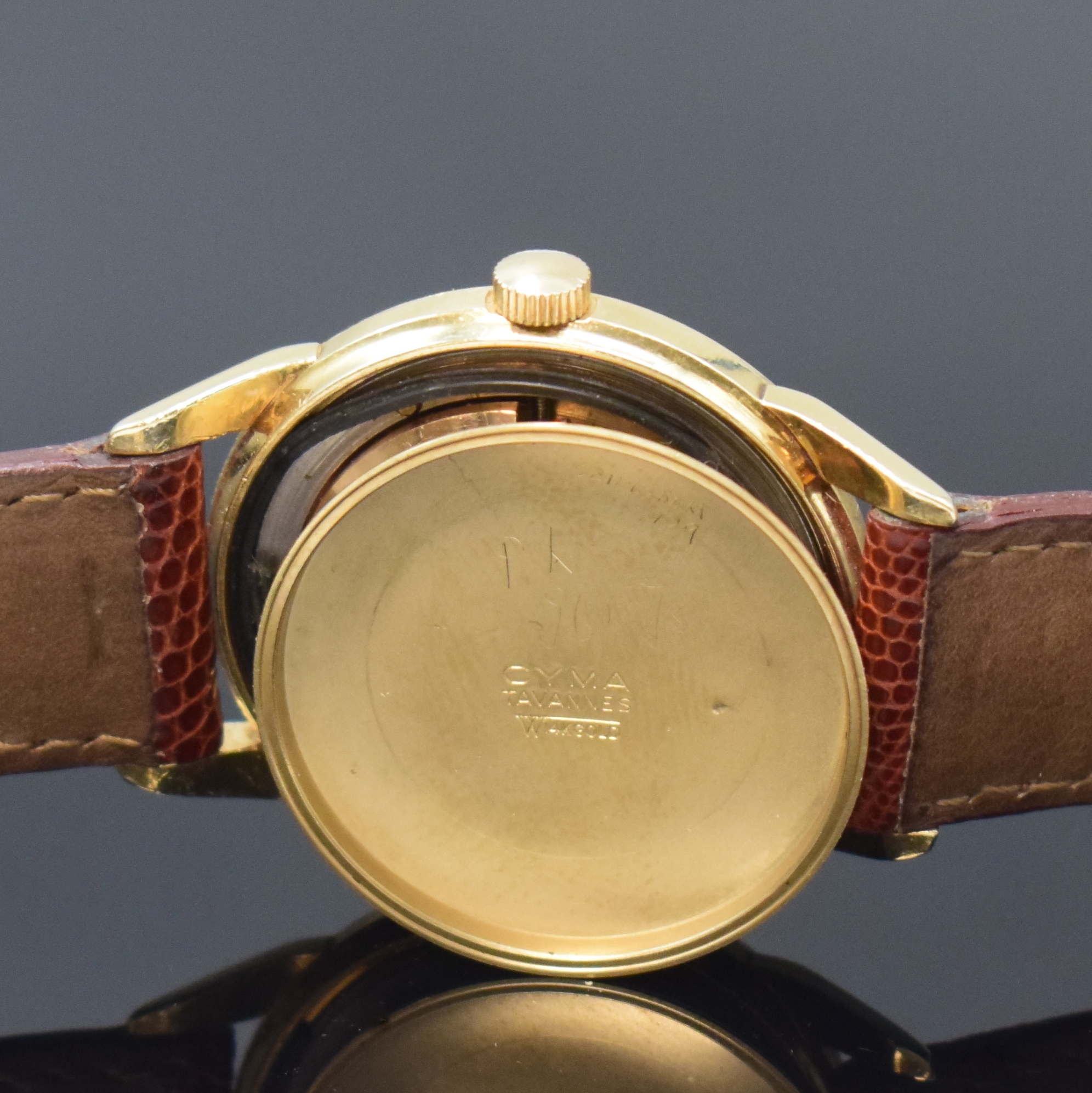 Detail e: CYMA Herrenarmbanduhr in GG 585/000, Schweiz / USA um 1950, Hammerautomatik, verschr. USA-Geh., Boden sign., silb. orig. Zifferbl. pat., gold. ...