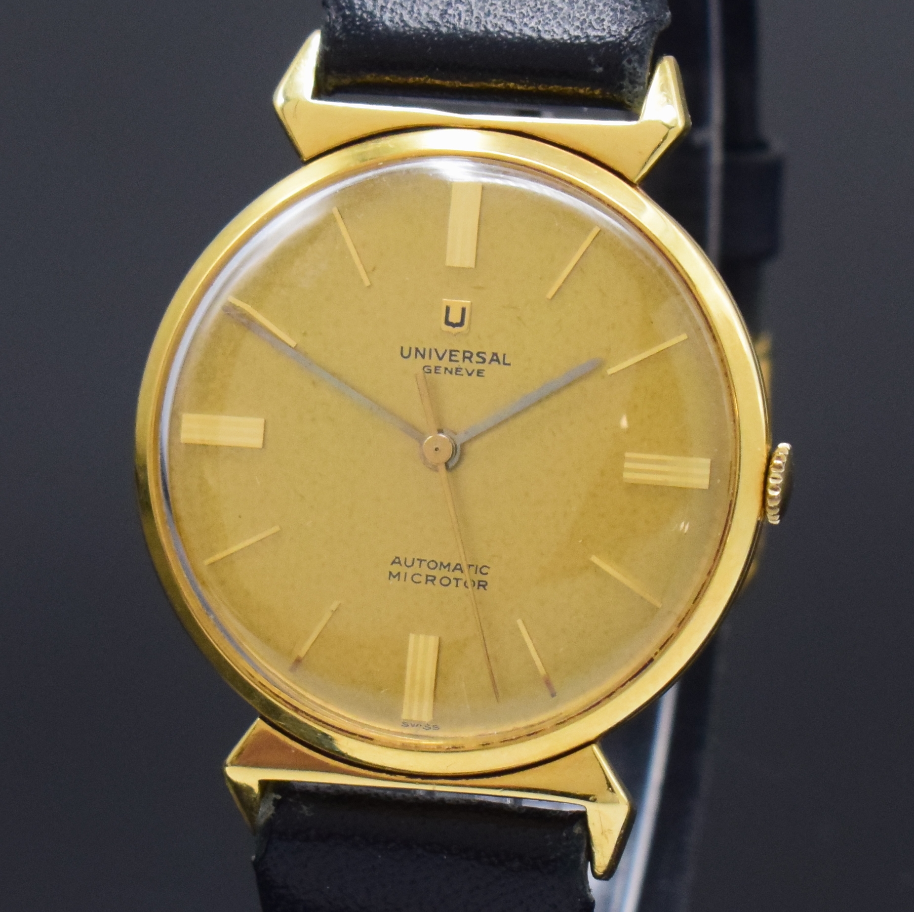 Detail a: UNIVERSAL Geneve Automatik Armbanduhr Kaliber 215 in GG 750/000 Referenz 10368 3, Schweiz um 1965, 3-tlg. Geh., Boden u. Glasrand aufgedr., gold. ...