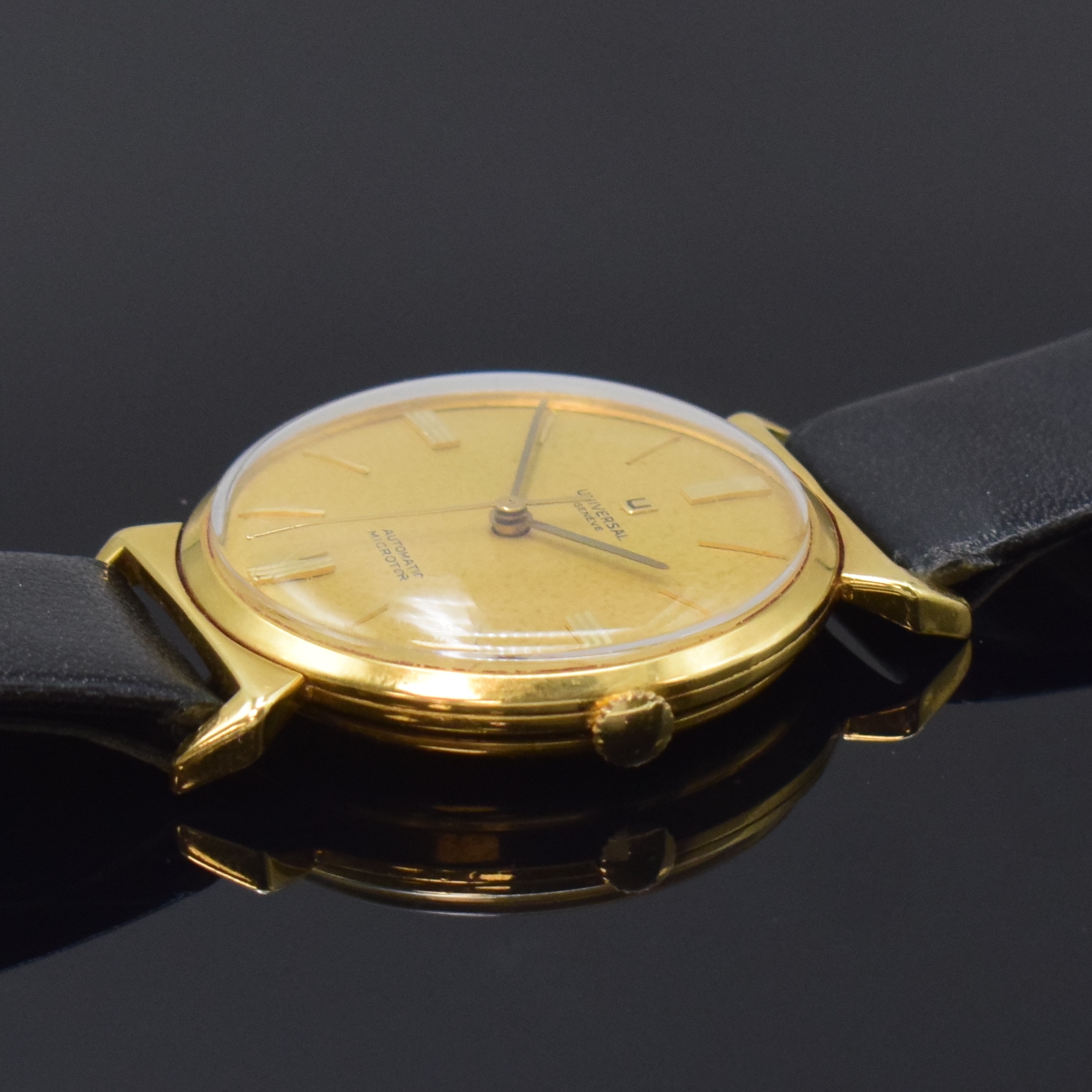 Detail b: UNIVERSAL Geneve Automatik Armbanduhr Kaliber 215 in GG 750/000 Referenz 10368 3, Schweiz um 1965, 3-tlg. Geh., Boden u. Glasrand aufgedr., gold. ...