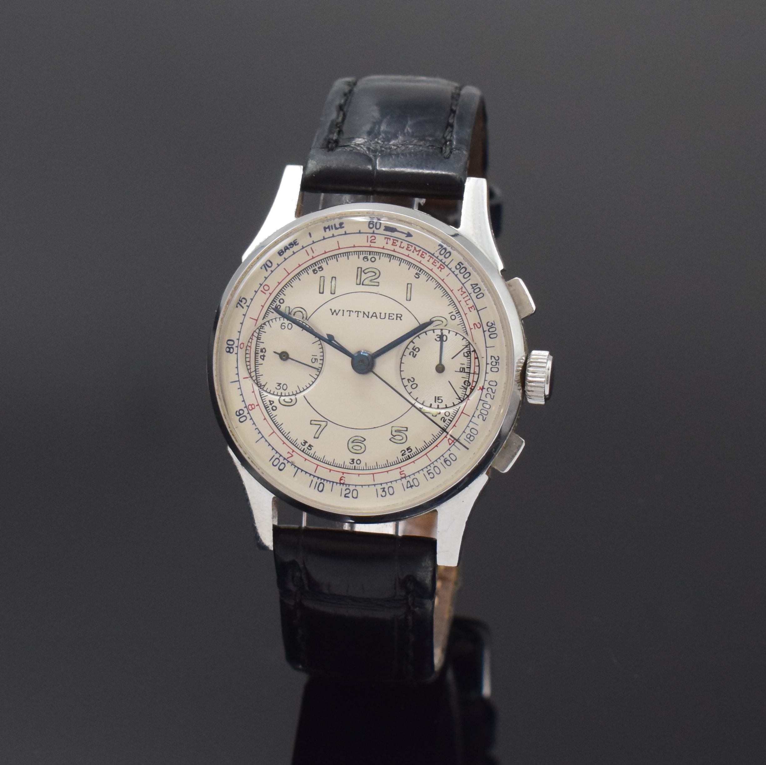 WITTNAUER Schaltradchronograph in Stahl, Schweiz um 1945, Handaufzug, 3-tlg. Geh., Boden u. Glasrand aufgedr., silb. Zifferbl. rest., gebl. Zeiger, ...