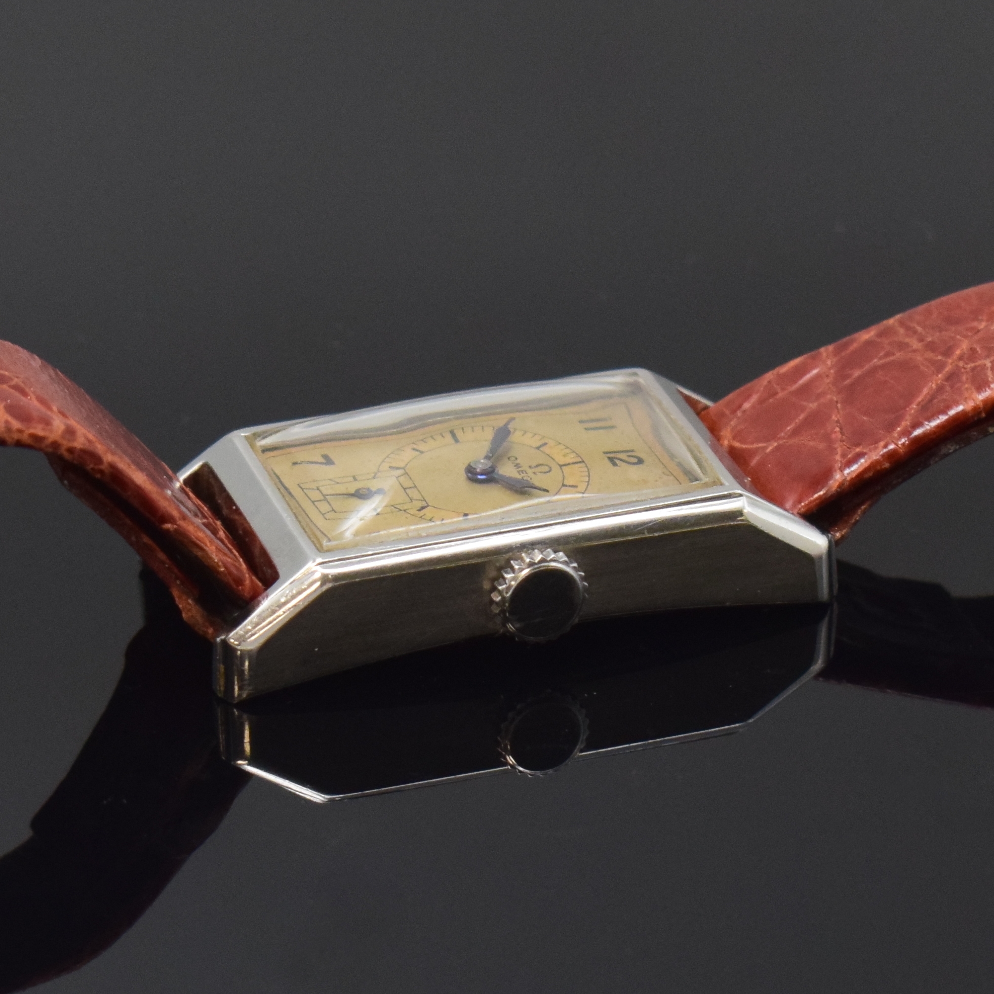 Detail b: OMEGA T17 rechteckige Armbanduhr in Stahl, Schweiz um 1936, Handaufzug, 2-tlg. Geh., Boden aufgedr., orig. Zifferbl. pat. m. emailliertem Druck, ...