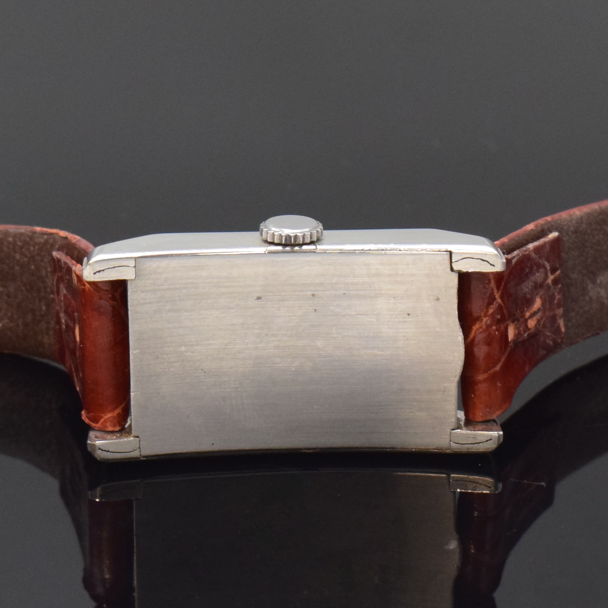 Detail c: OMEGA T17 rechteckige Armbanduhr in Stahl, Schweiz um 1936, Handaufzug, 2-tlg. Geh., Boden aufgedr., orig. Zifferbl. pat. m. emailliertem Druck, ...