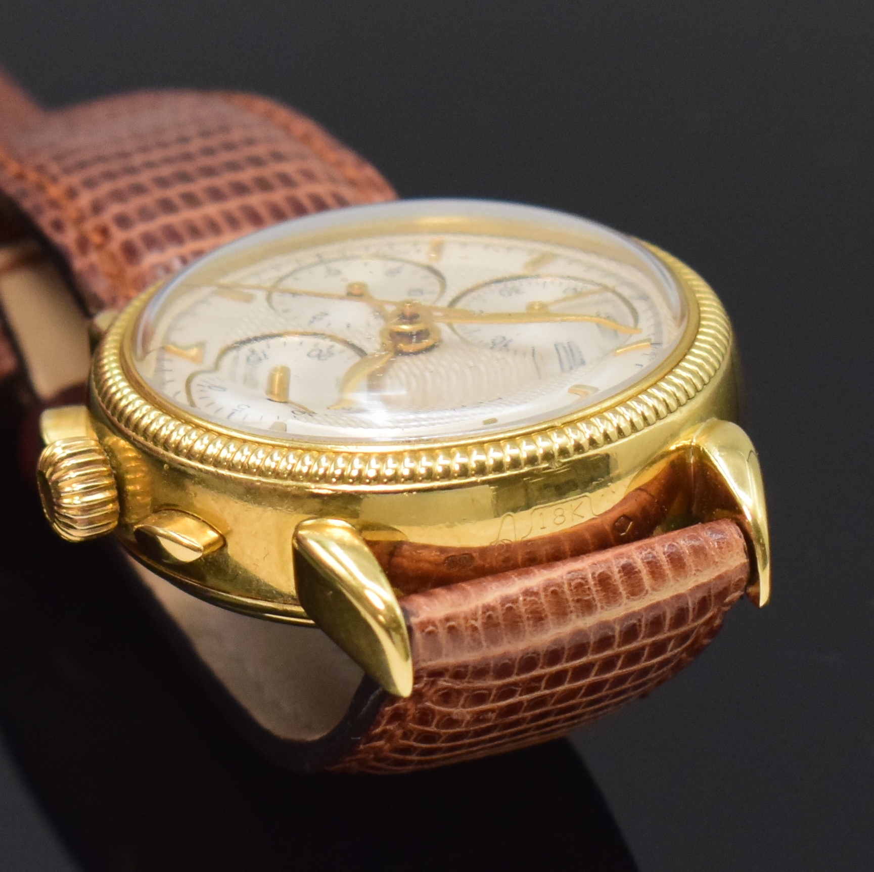 Detail c: REPCO Armbandchronograph in GG 750/000, Schweiz um 1990, Handaufzug, beids. vergl. Geh., Boden aufgedr., geriffelte Lünette, silb. ...