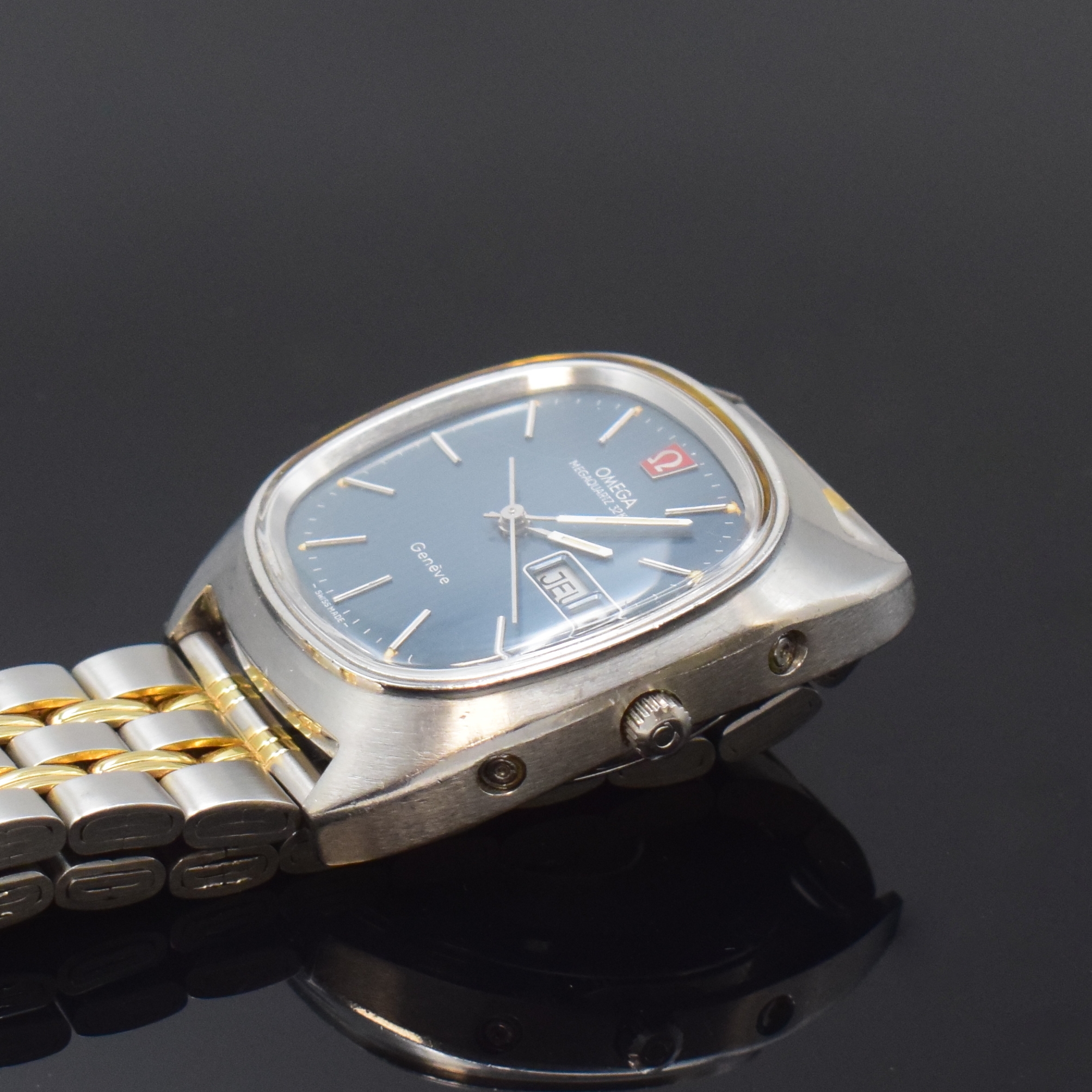 Detail c: OMEGA Megaquarz 32KHz Herrenarmbanduhr in Stahl Referenz 196.008, Schweiz um 1974, quarz, neutr. Gliederband m. Faltschl., Boden verschr., ...