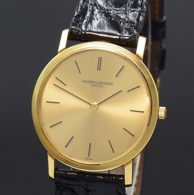 26785119a - VACHERON & CONSTANTIN thin elegant 18k yellow gold wristwatch reference 6351, Switzerland around 1965, manual winding, two piece construction case, snap on case back, original winding crown, gilded dial, applied black indices, rhodium plated movement calibre 1003 with fausses cotes decoration, 17 jewels, 5 adjustments, seal of Geneva, diameter approx. 32,5 mm, condition 2, property of a collector