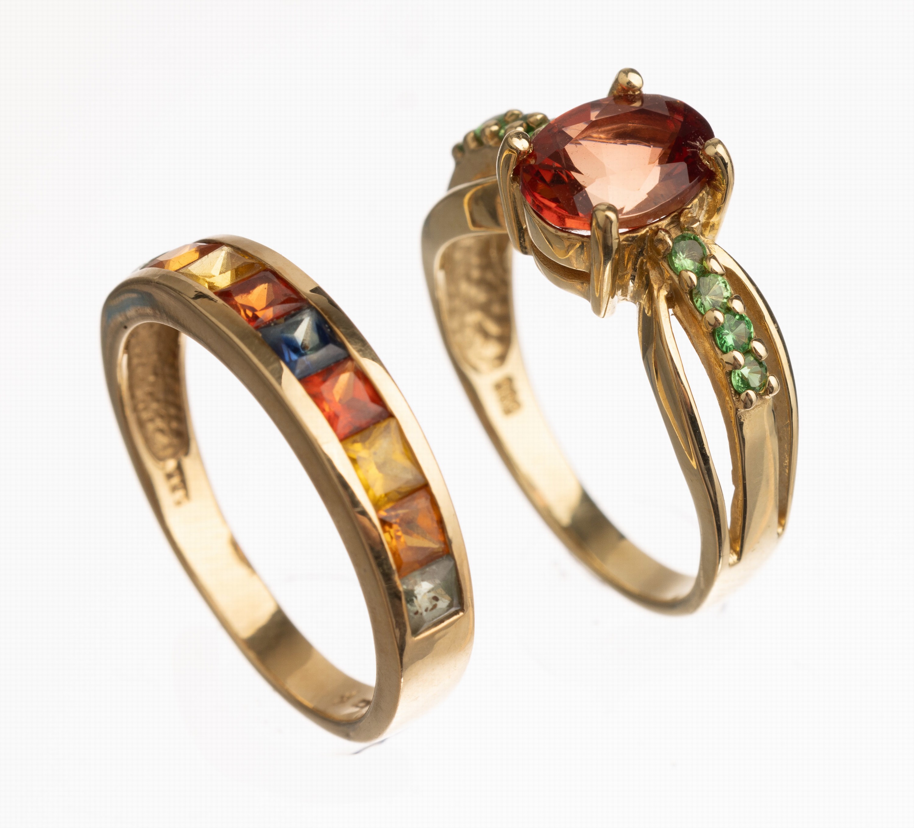 Konvolut 2 14 kt Gold Ringe, GG 585/000, 1 x ovalfacett. Heliolith ca. 1.80 ct, 8 rundfacett. Tsavorithe zus. ca. 0.14 ct, total ca. 4.4 g, RW 56 1 ...