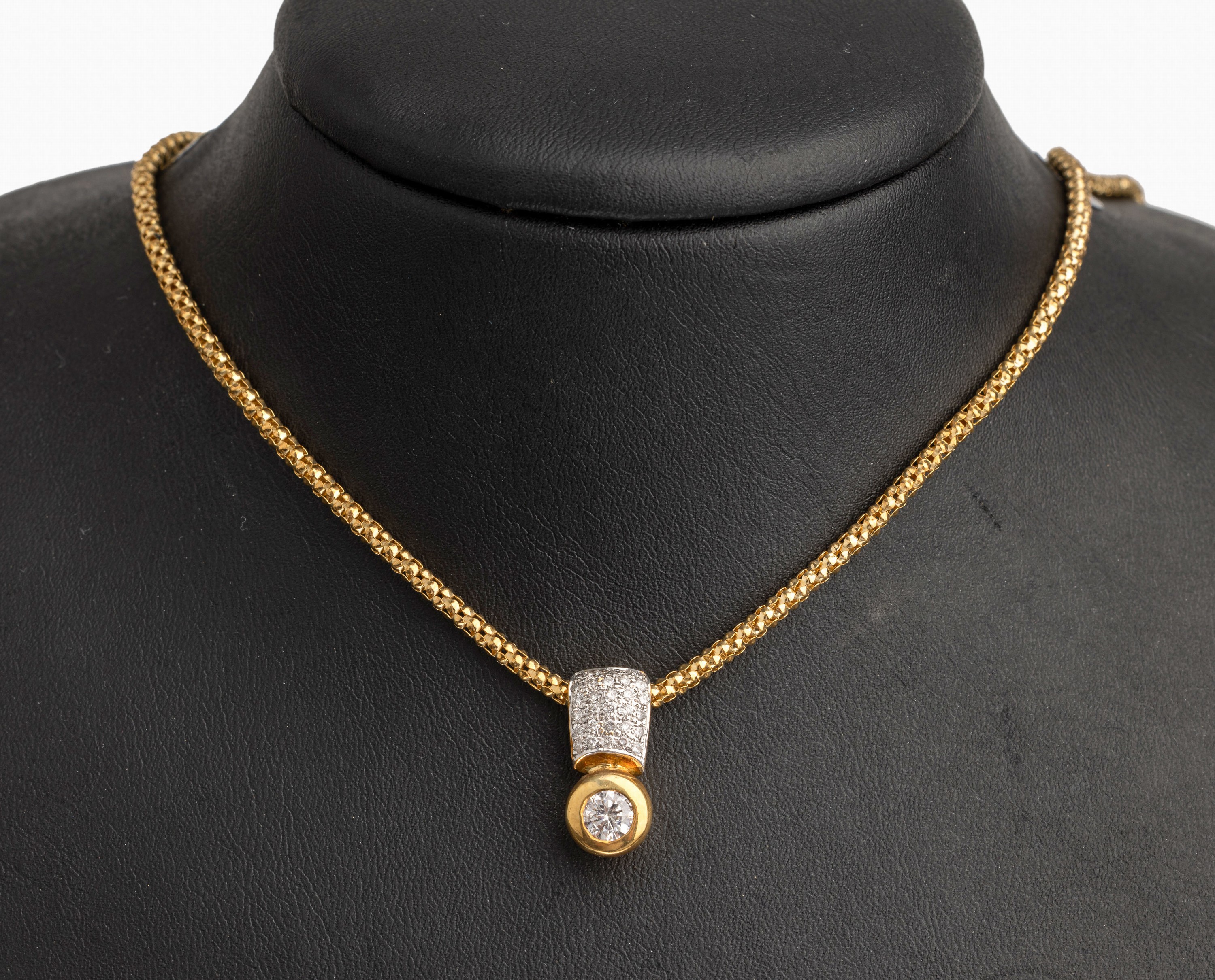 14 kt Gold Brillant Anhänger mit Kette, GG/WG 585/000, 1 Brillant ca. 0.53 ct Weiß/p1,30 Brillanten zus. ca. 0.44 ct Weiß/si, total ca. 12.3 g, L ...