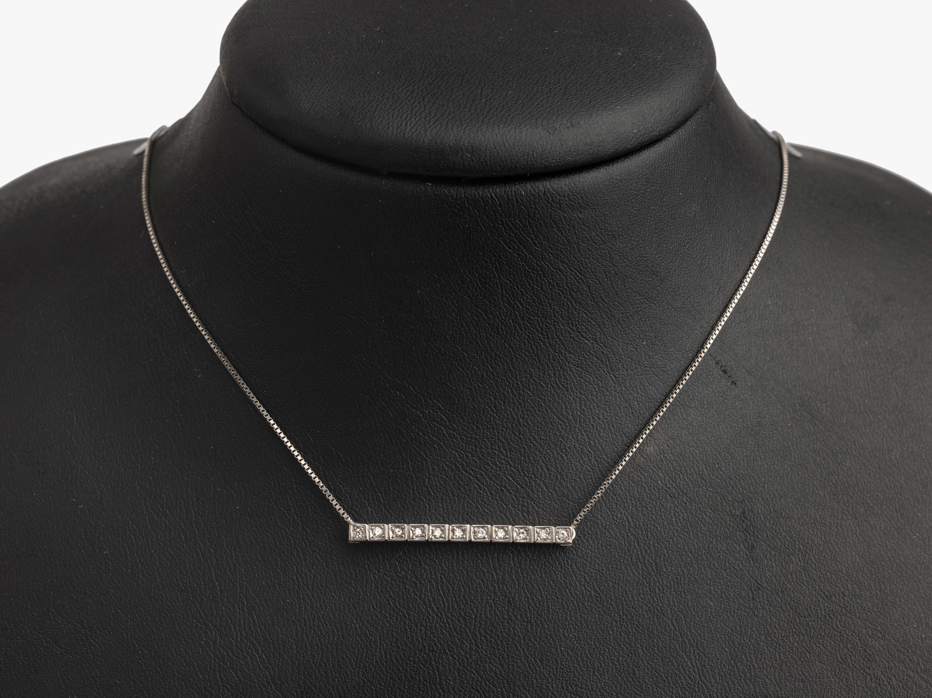 14 kt Gold Brillant Collier, WG 585/000, 11Brillanten zus. ca. 0.15 ct Weiß/si, total ca.4.1 g, L ca. 39 bzw. 41 cm, Federringschließe