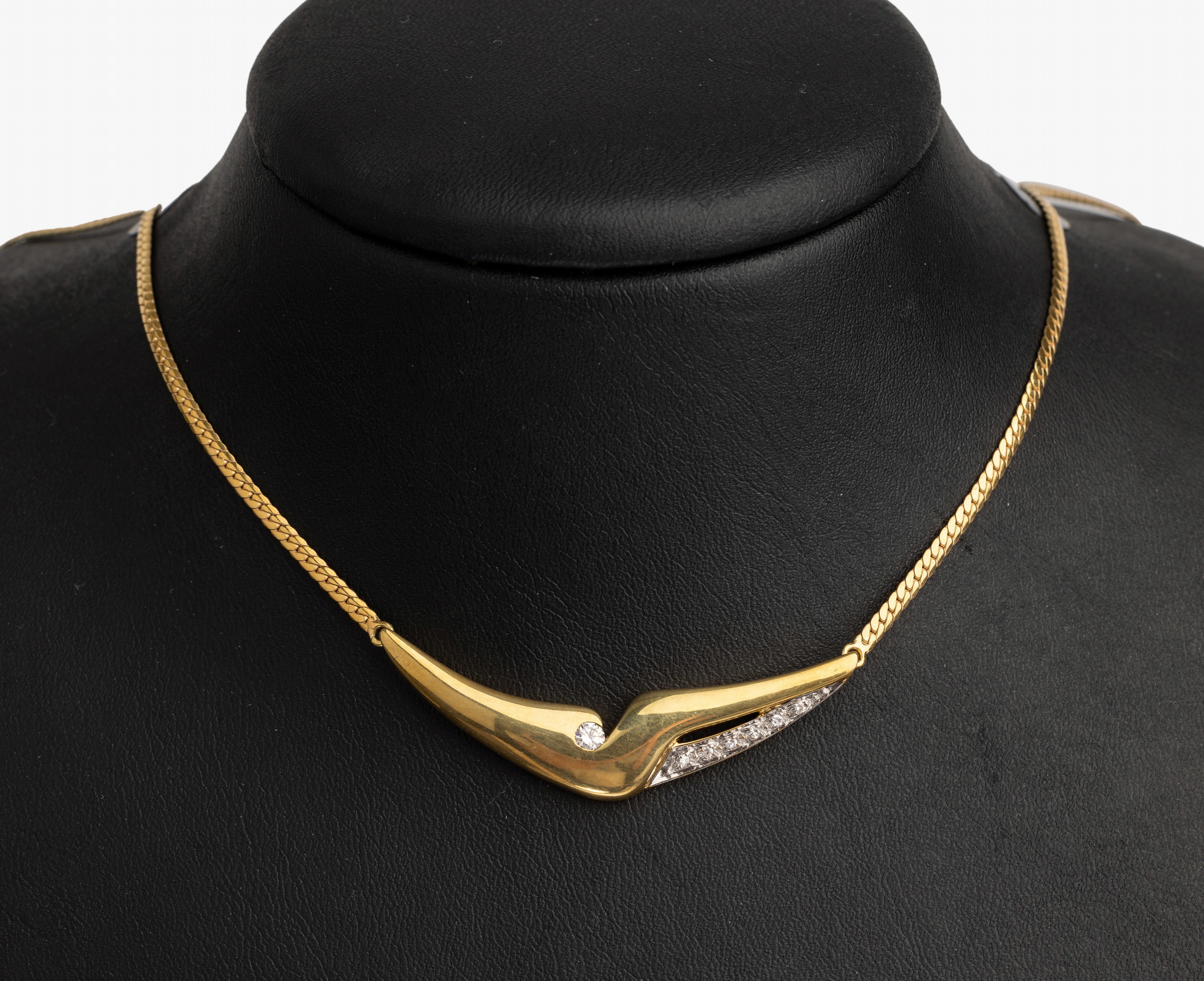 14 kt Gold Brillant Collier, GG/WG 585/000,7 Brillanten zus. ca. 0.15 ct Weiß/si, total ca. 10.2 g, L ca. 42 cm