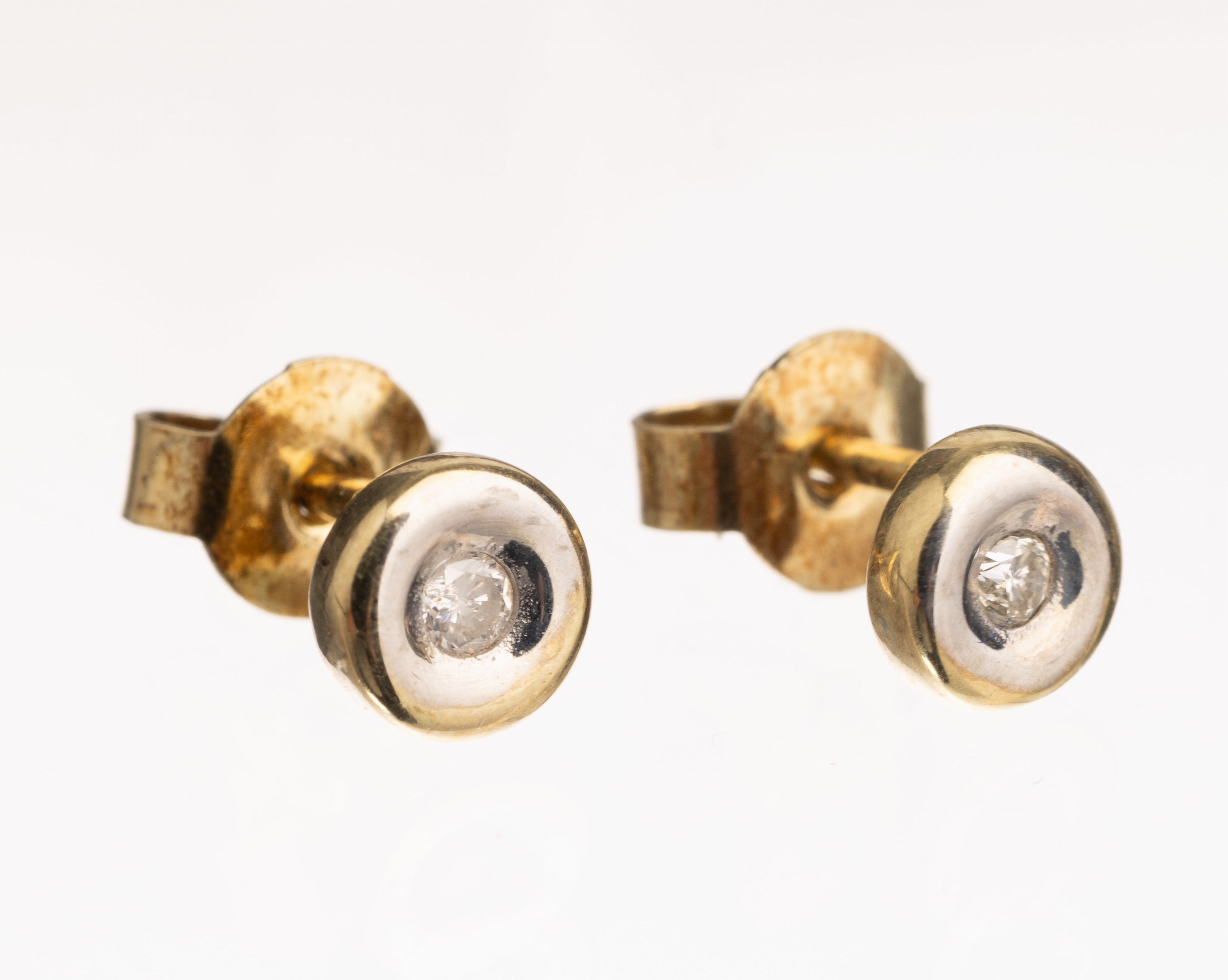 Paar 14 kt Gold Brillant Ohrstecker, GG 585/000, 2 Brillanten zus. ca. 0.06 ct Weiß/si