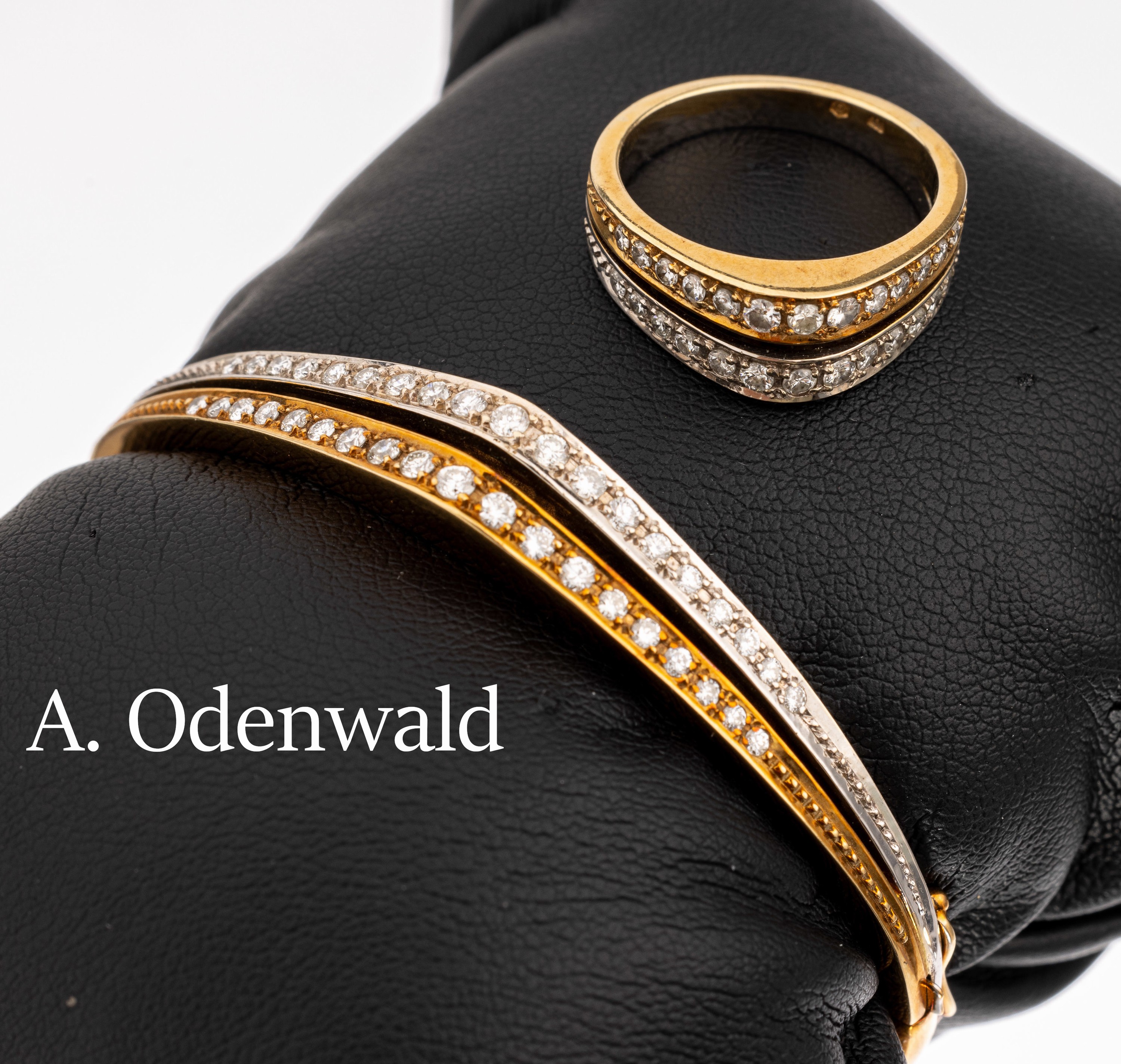 14 kt Gold Diamant Schmuck-Set, GG/WG 585/ 000, best. aus: Armreif und Ring, MeistermarkeODENWALD, 64 Brillanten zus. ca. 0.80 ct feines ...