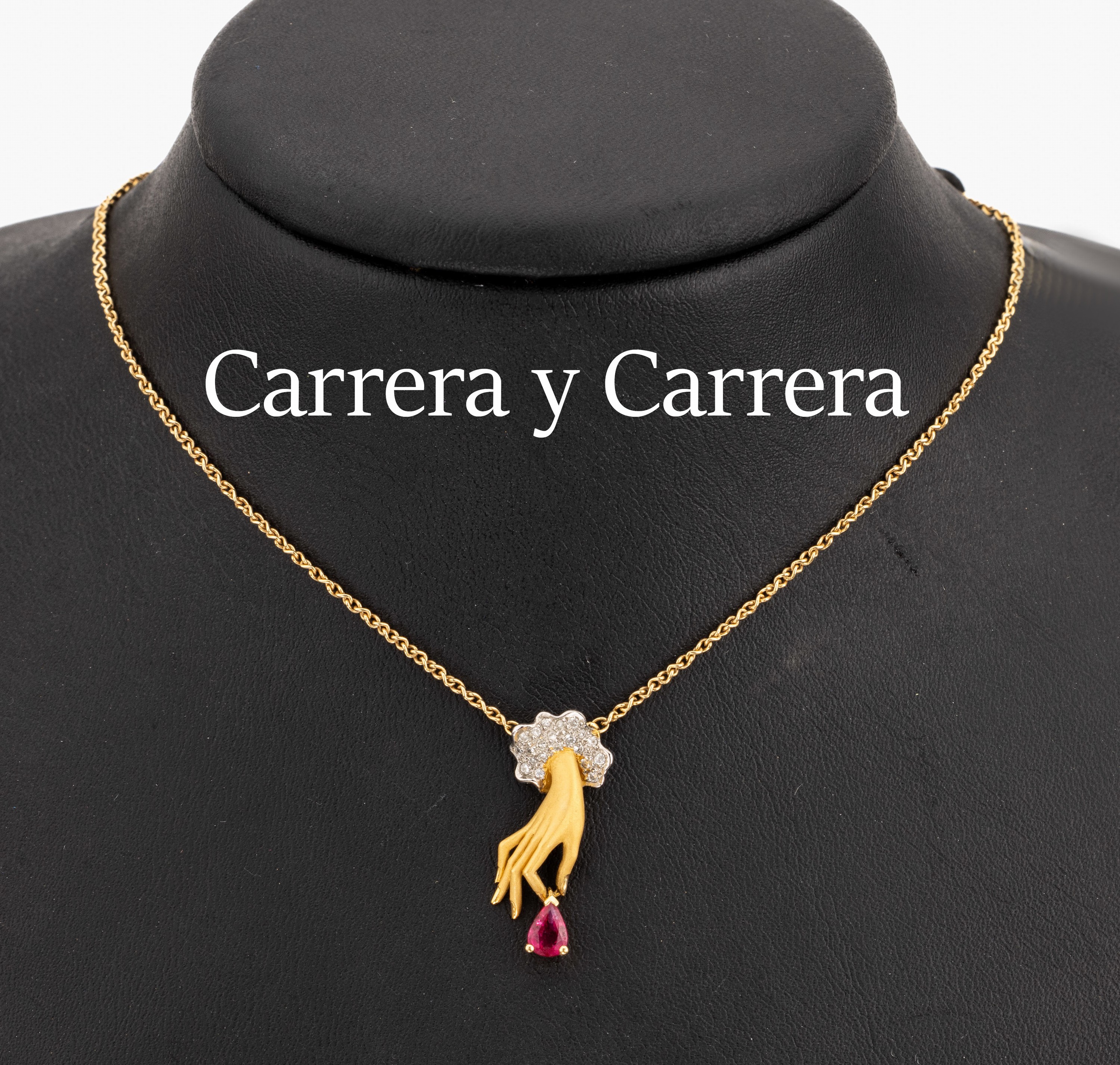 CARRERA Y CARRERA Rubin-Brillant-Collier "Hand", GG/WG 750/000, bewegl. Abhängung mit Rubin-Tropfen ca. 0.35 ct, Brillanten auf ...