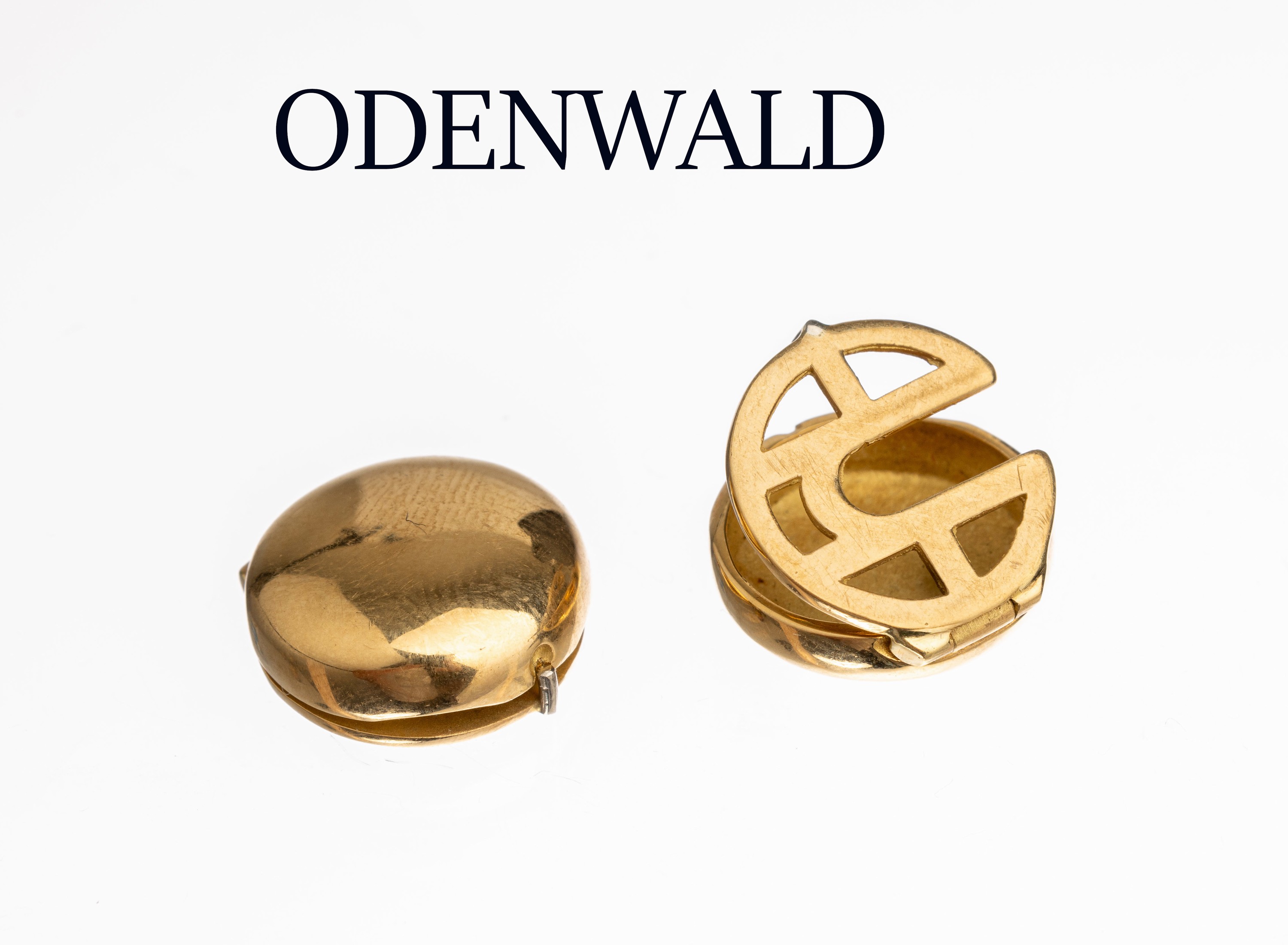 Paar 18 kt Gold Knopfverzierungen, GG 750/000, Meistermarke ODENWALD, total ca. 9.9 g, D. ca. 1.5 cm