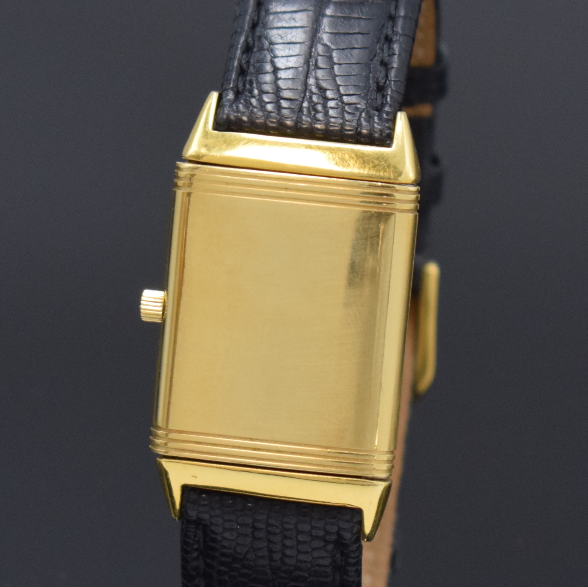 Detail c: Jaeger-LeCoultre Reverso Armbanduhr in GG 750/000, Schweiz um 1995, quarz, um 180 Grad drehb. Wendegeh., seitl. verschr., cremefarb. Zifferbl. m. ...