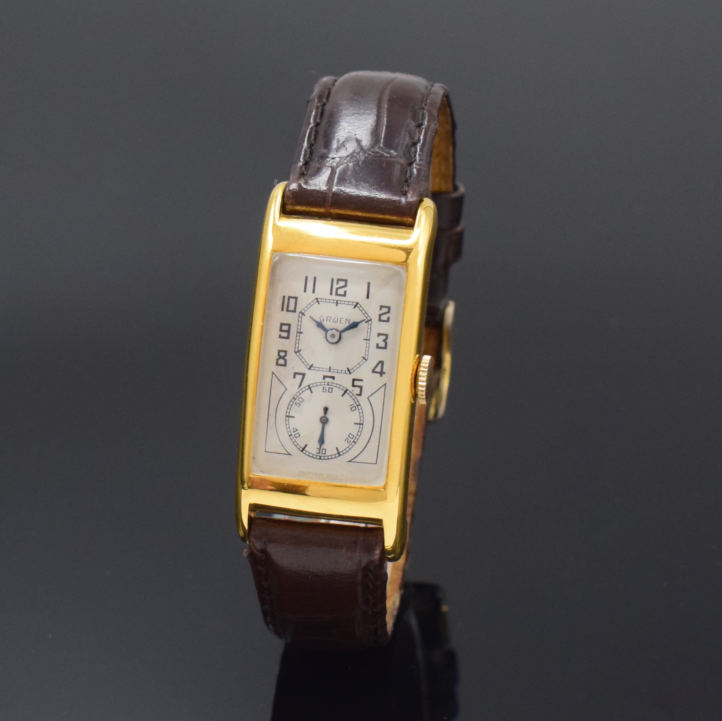 GRUEN Duo-Dial rechteckige Armbanduhr 10k GG- Filled, Schweiz/USA um 1936, rectangulär, M. ca. 43 x 21 mm, Boden aufgedr., in sich gewölbt, ...