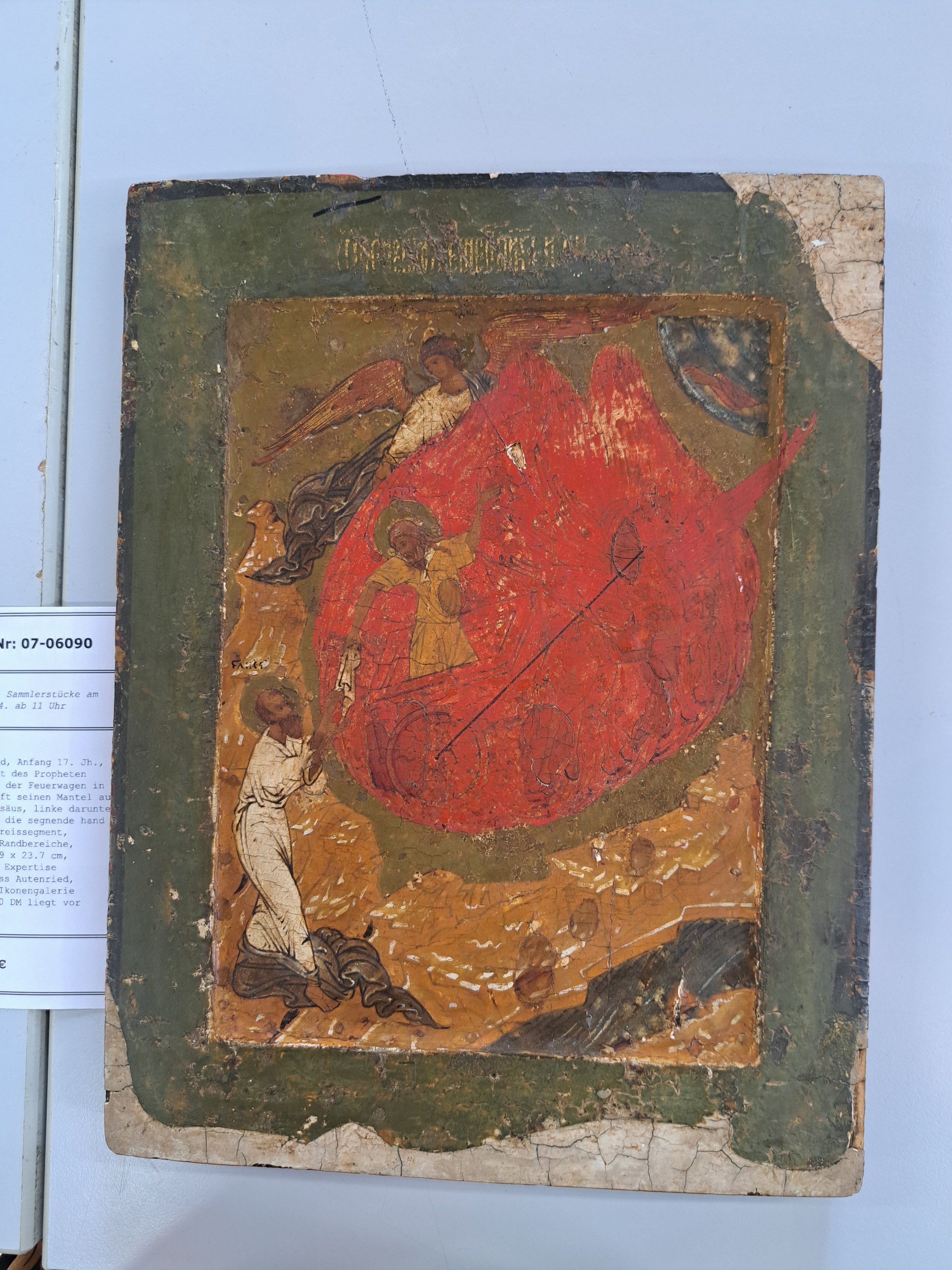 Detail b: Ikone, Nordrussland, Anfang 17. Jh., feurige Himmelfahrt des Propheten Elias, Elias fährt der Feuerwagen in den Himmel und wirft seinen Mantel auf ...