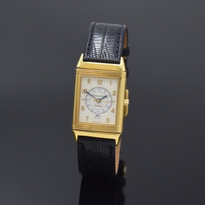 Image 26786819 - Jaeger-LeCoultre Reverso 18k yellow gold wristwatch, Switzerland around 1995, quartz, around 180 degree revolving reverse case, at the sides screwed down, cream colored dial with Arabic numerals, blued steel hands, date at 6, measures approx. 40 x 23 mm, case number as well as reference number not visible anymore, signs of use, condition 2-3