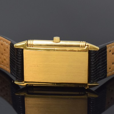 26786819f - Jaeger-LeCoultre Reverso 18k yellow gold wristwatch, Switzerland around 1995, quartz, around 180 degree revolving reverse case, at the sides screwed down, cream colored dial with Arabic numerals, blued steel hands, date at 6, measures approx. 40 x 23 mm, case number as well as reference number not visible anymore, signs of use, condition 2-3