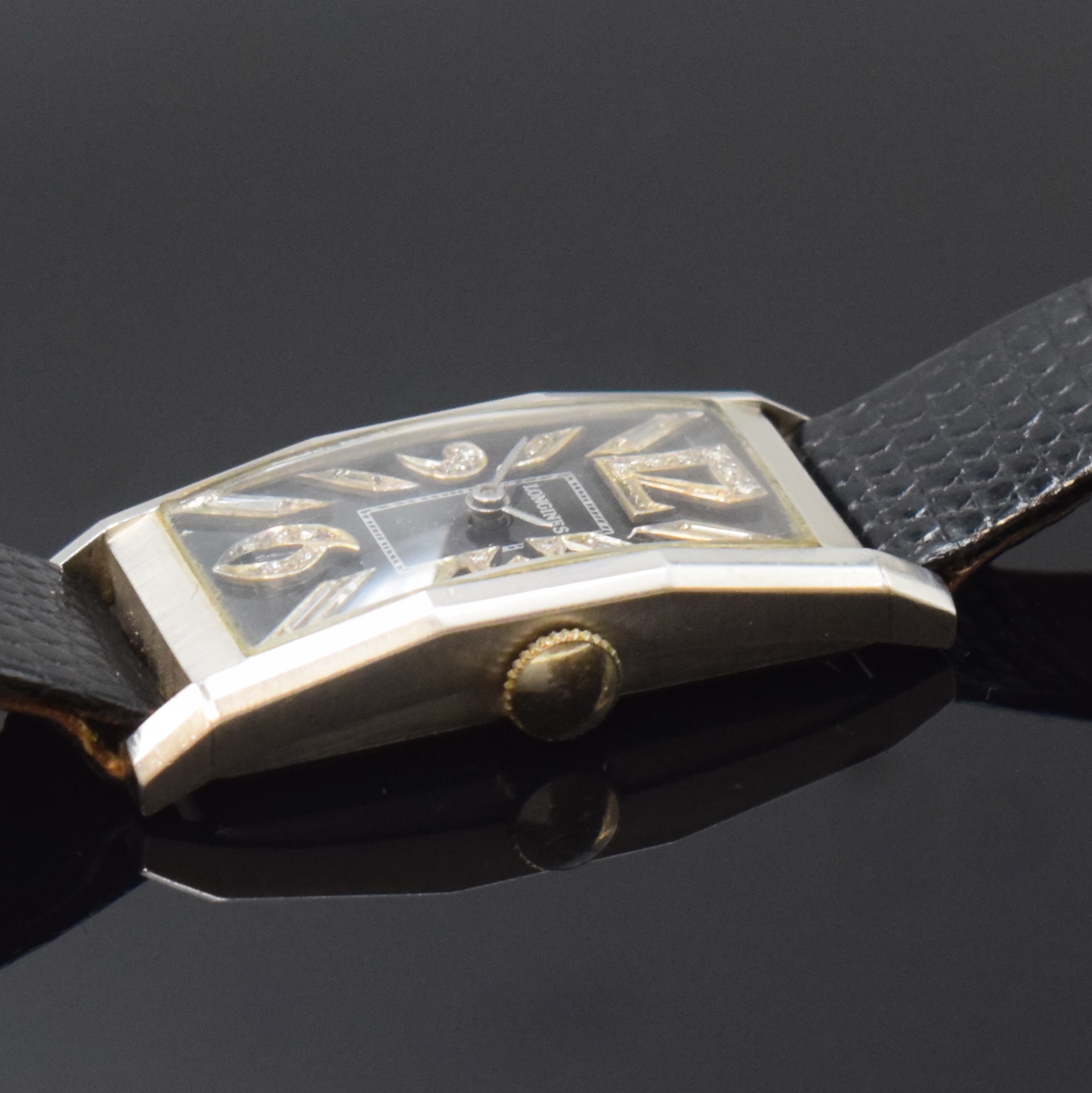Detail c: LONGINES Herrenarmbanduhr in Platin mit Diamanten, Schweiz für USA um 1939, Handaufzug, neutr. Gehäuse (10%IRID.Plat.), Boden aufgedr., rest. ...