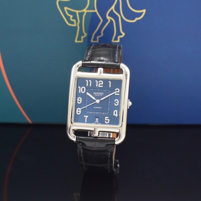 Image HERMES wristwatch series Cape Cod reference CD7.810, self winding, stainless steel case including original leather strap with original deployant clasp, on both sides glazed, case back screwed-down 4-times, blue dial with Arabic hour, display of hour, minutes, sweep seconds & date, measures approx. 33 x 46 mm, Hermes storage back enclosed, condition 1-2