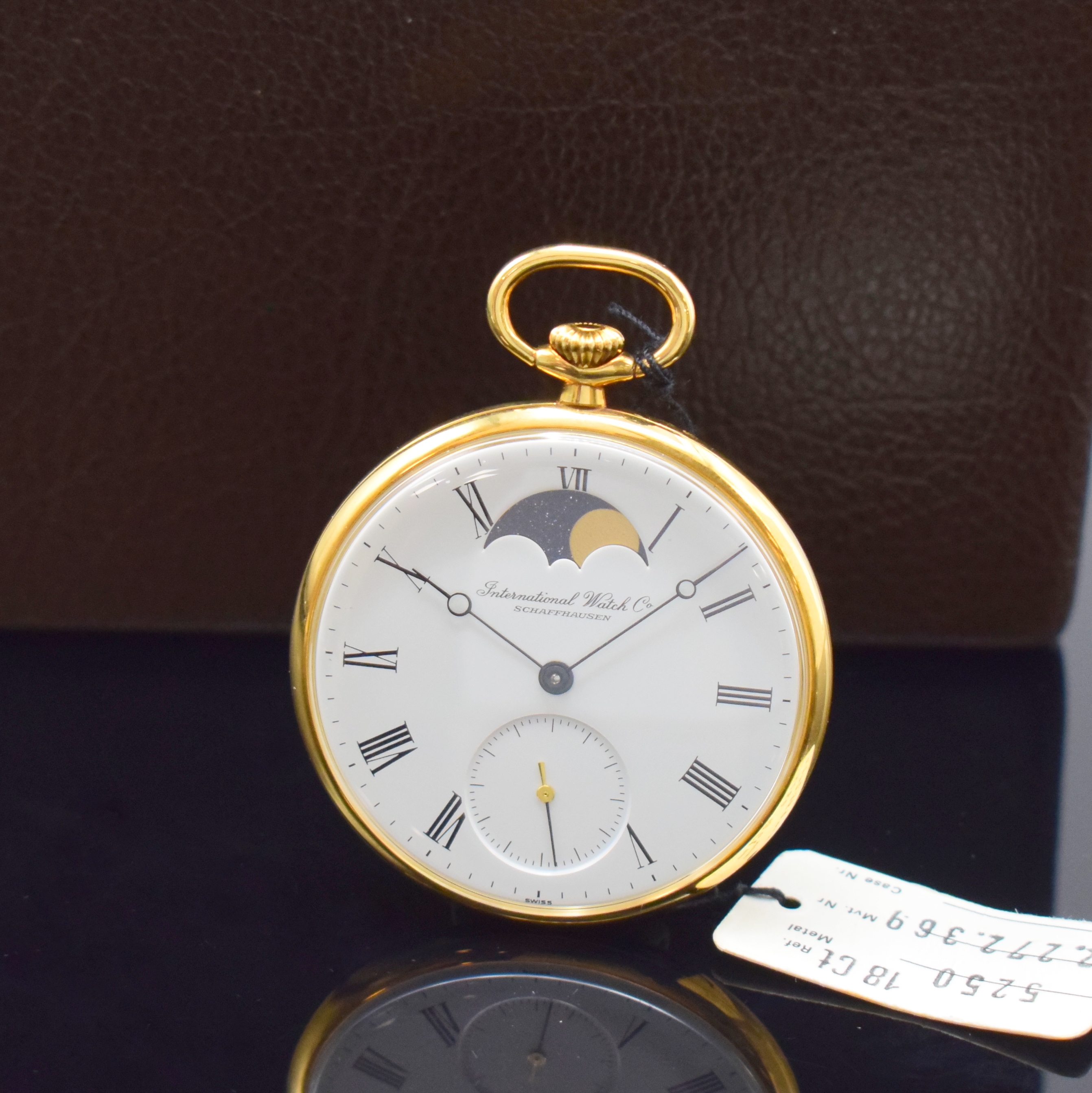 IWC seltene, offene Herrentaschenuhr mit Mondphase in GG 750/000 Referenz 5250, Schweiz um 1985, Handaufzug, glattes Geh., weißes Zifferbl. m. röm. ...