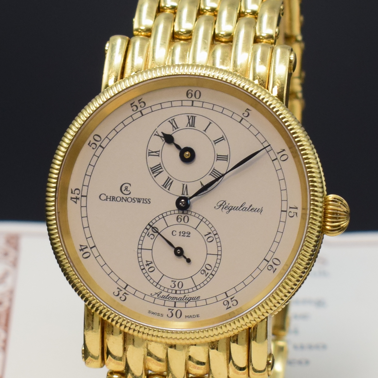 Detail a: CHRONOSWISS Herrenarmbanduhr Regulateur in GG 750/000 Referenz CH 1221, Schweiz um 2000, Automatik, beids. vergl. Geh. inkl. orig. Goldband m. dopp. ...