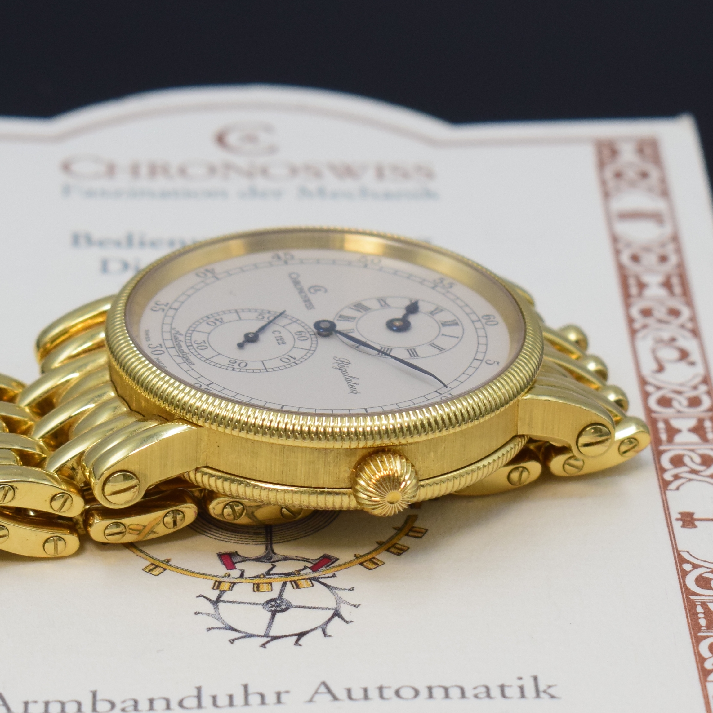 Detail d: CHRONOSWISS Herrenarmbanduhr Regulateur in GG 750/000 Referenz CH 1221, Schweiz um 2000, Automatik, beids. vergl. Geh. inkl. orig. Goldband m. dopp. ...
