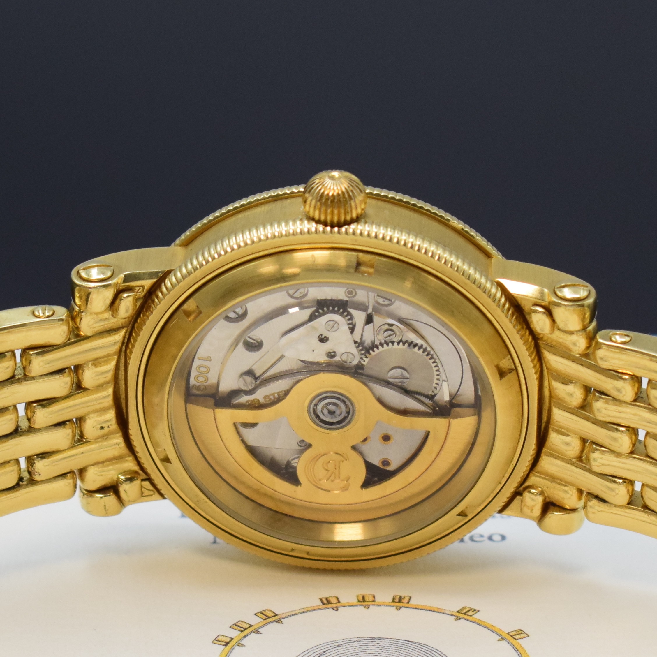 Detail e: CHRONOSWISS Herrenarmbanduhr Regulateur in GG 750/000 Referenz CH 1221, Schweiz um 2000, Automatik, beids. vergl. Geh. inkl. orig. Goldband m. dopp. ...