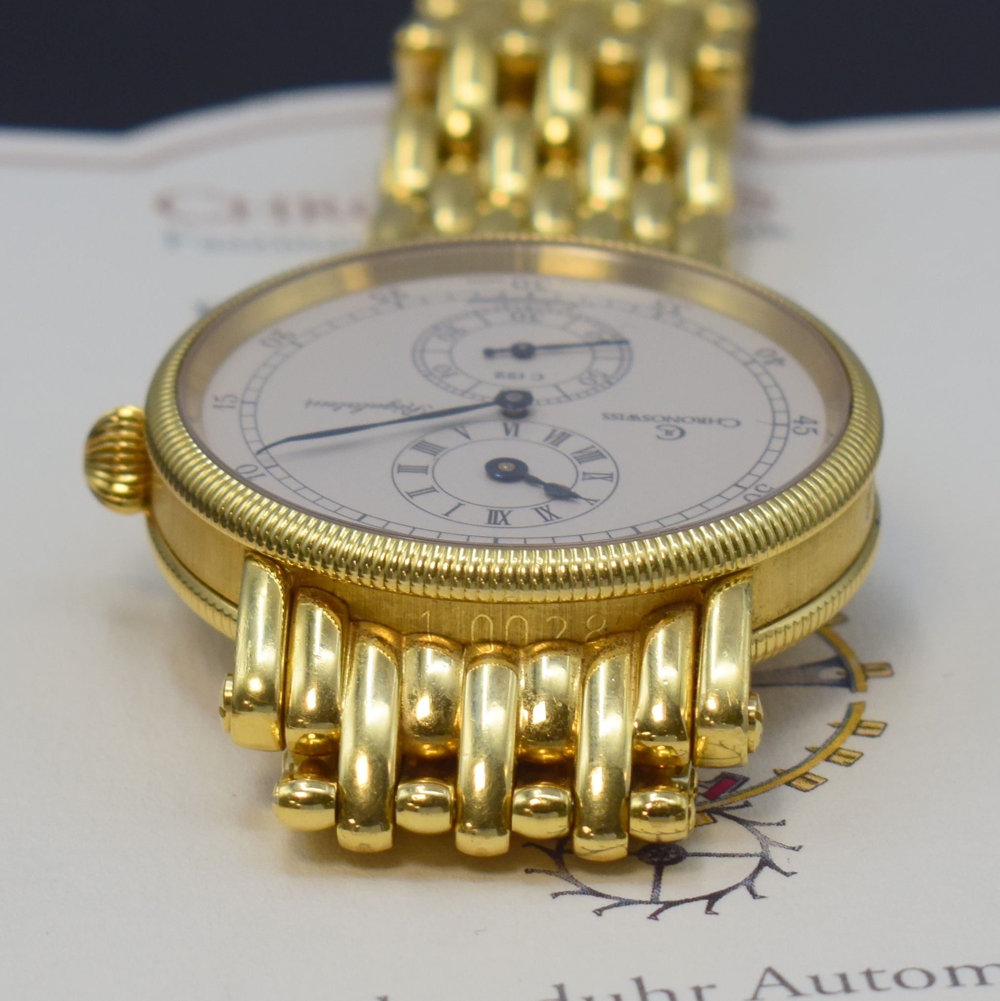 Detail h: CHRONOSWISS Herrenarmbanduhr Regulateur in GG 750/000 Referenz CH 1221, Schweiz um 2000, Automatik, beids. vergl. Geh. inkl. orig. Goldband m. dopp. ...