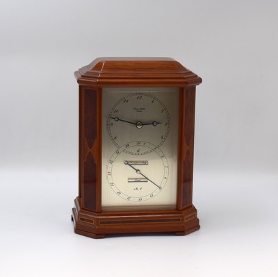 26787973a - ERWIN SATTLER rare, to 200 pieces limited table clock with perpetual calendar model 1294, Germany around 2000, key winding, specification from the year 1903, precious wood housing with gold-plated brass columns, bevelled glass, silvered dial with Arabic numerals, blue hands, gold-plated 8-days watch mechanism with 11 jewels calibre 1200, separate calendar work with 1 year duration of run, measures approx. 23 x 16,5 x 11,5 cm, original box, key, description and Certificate of origin enclosed, condition 2