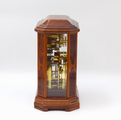 26787973e - ERWIN SATTLER rare, to 200 pieces limited table clock with perpetual calendar model 1294, Germany around 2000, key winding, specification from the year 1903, precious wood housing with gold-plated brass columns, bevelled glass, silvered dial with Arabic numerals, blue hands, gold-plated 8-days watch mechanism with 11 jewels calibre 1200, separate calendar work with 1 year duration of run, measures approx. 23 x 16,5 x 11,5 cm, original box, key, description and Certificate of origin enclosed, condition 2