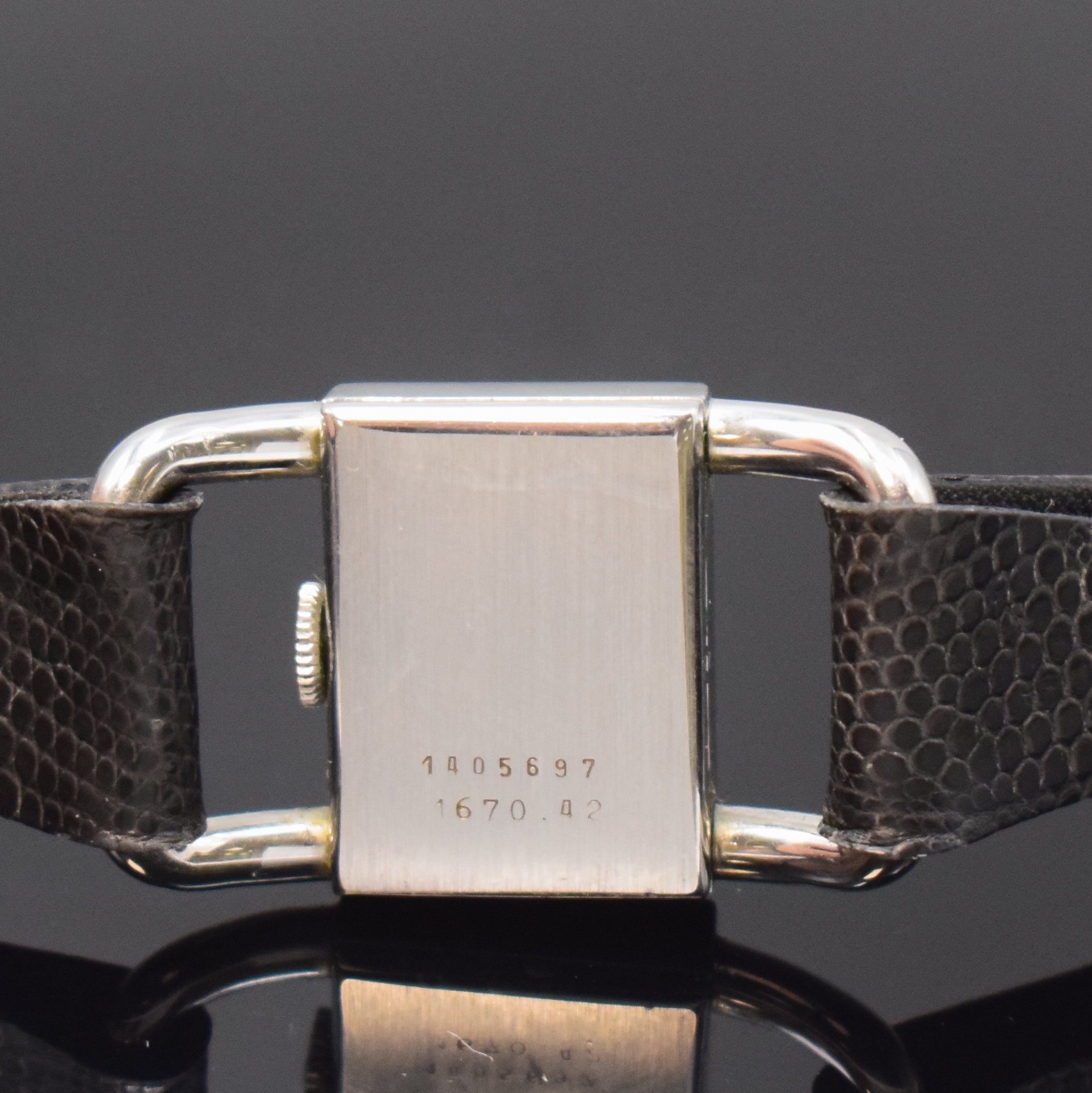 Detail c: Jaeger-LeCoultre Etrier Damenarmbanduhr Referenz 1670.42, Schweiz um 1965, Handaufzug, Edelstahlgeh., Boden aufgedr., weißes Zifferbl. m. röm. ...